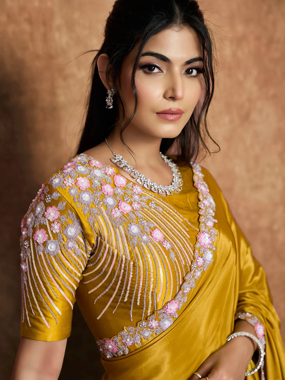 Tarani Samidha blouse view with dual sequin pearl handwork on mustard saree and floral embroidery