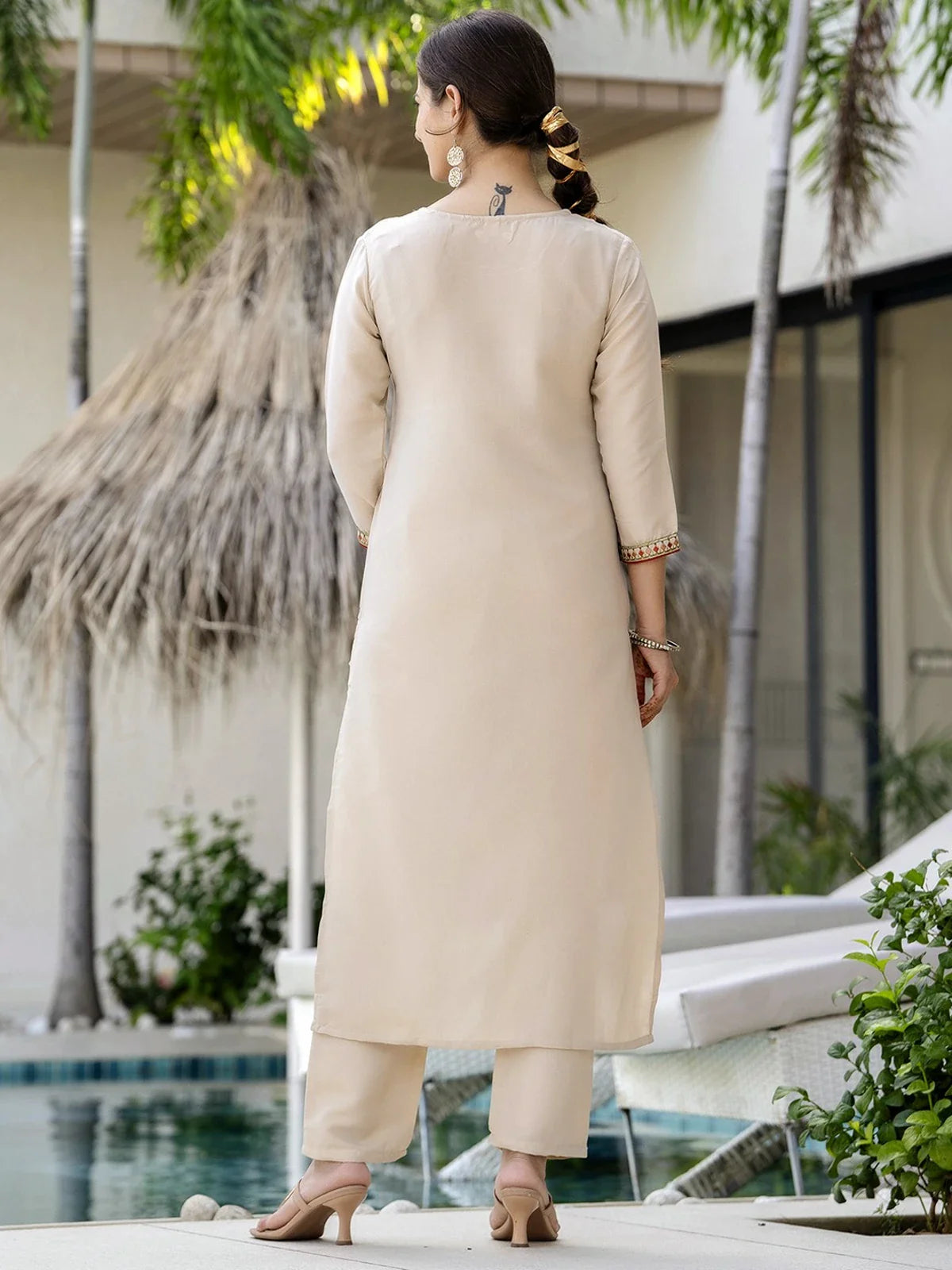 Tarani back view of rayon beige kurti with pant and embroidered sleeve hem for ethnic occasions