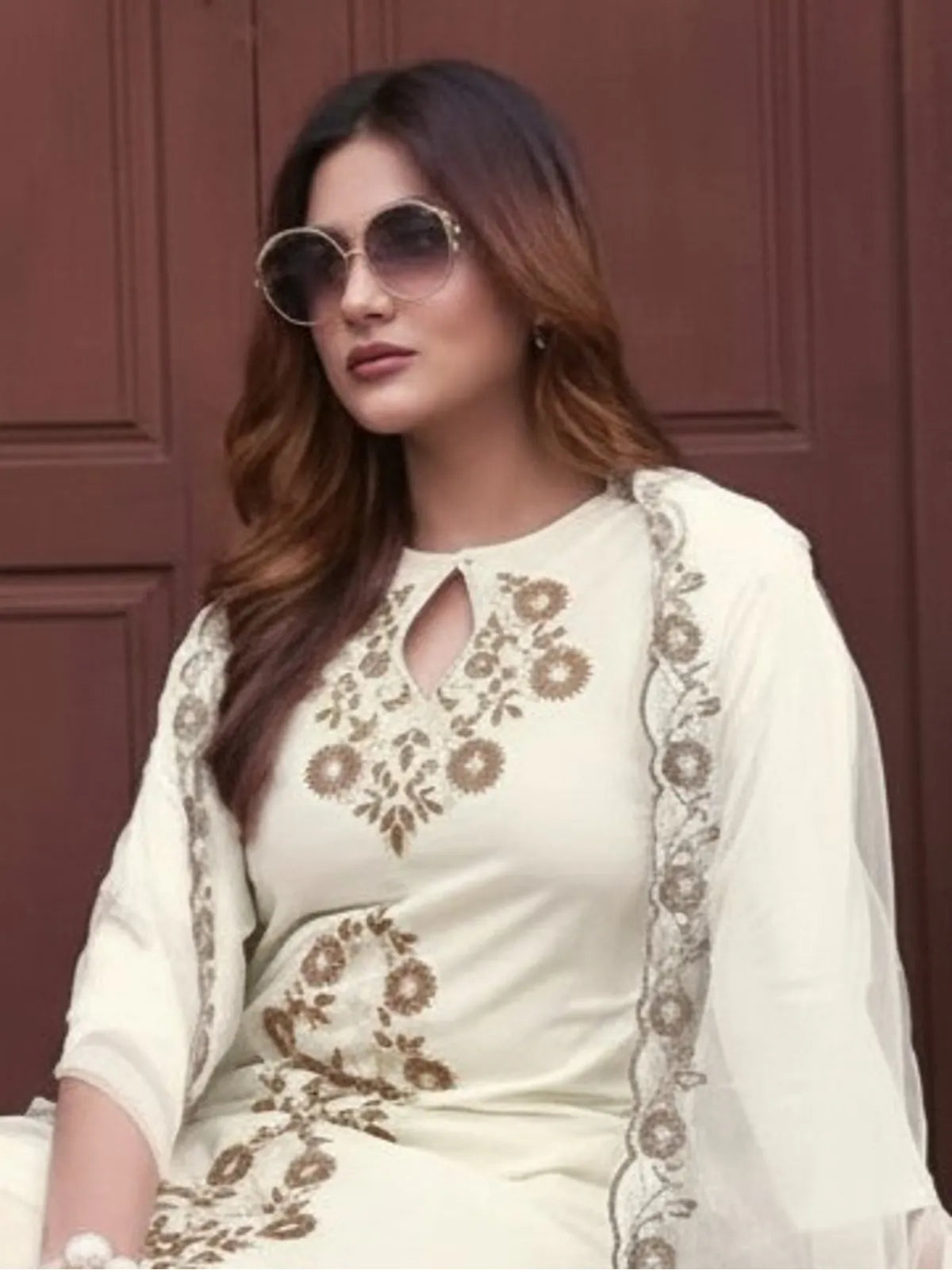 Tarani off white embroidered rayon dress closeup with floral detailing