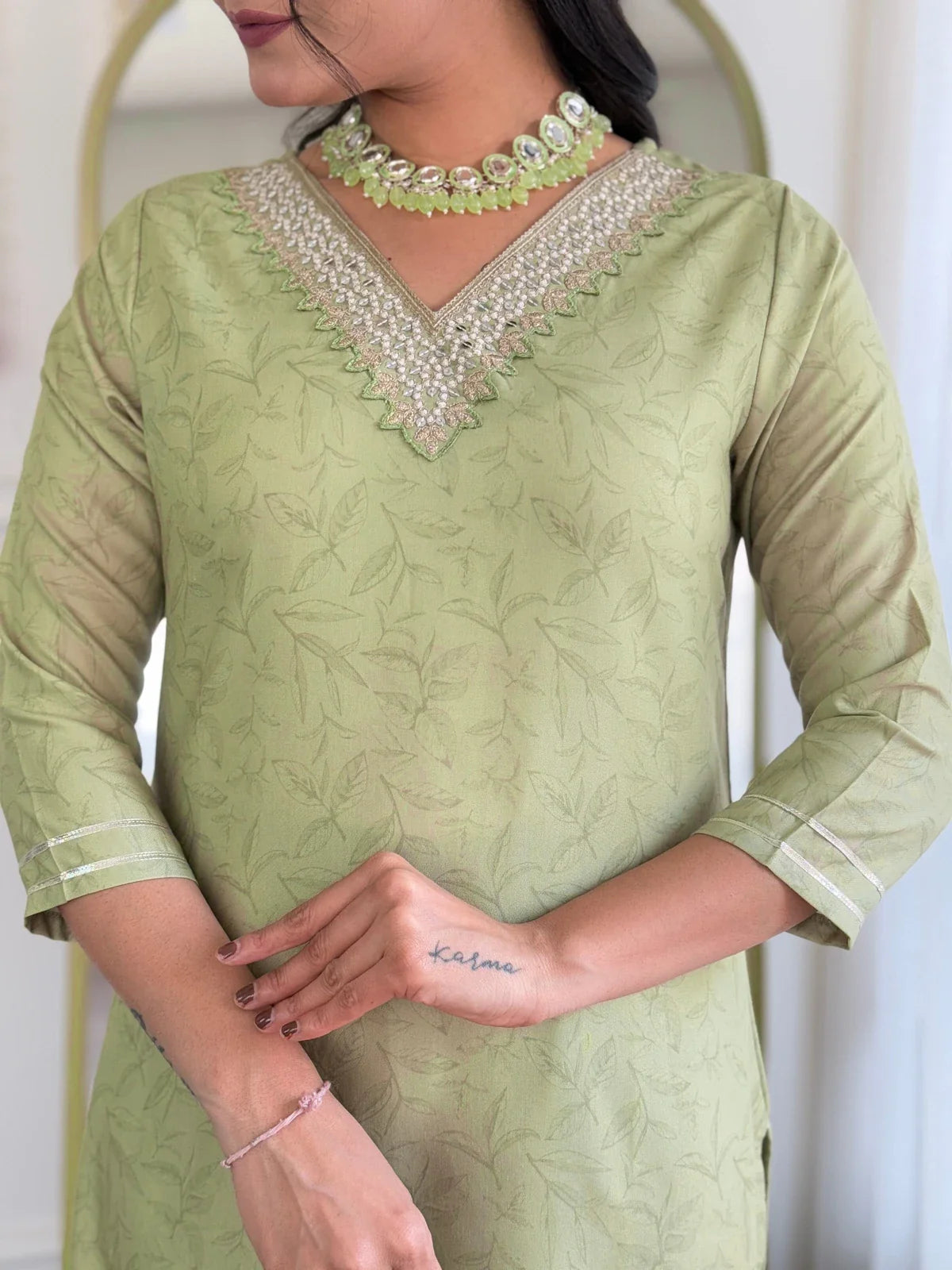 Tarani pista rayon kurti fabric closeup with neckline embroidery