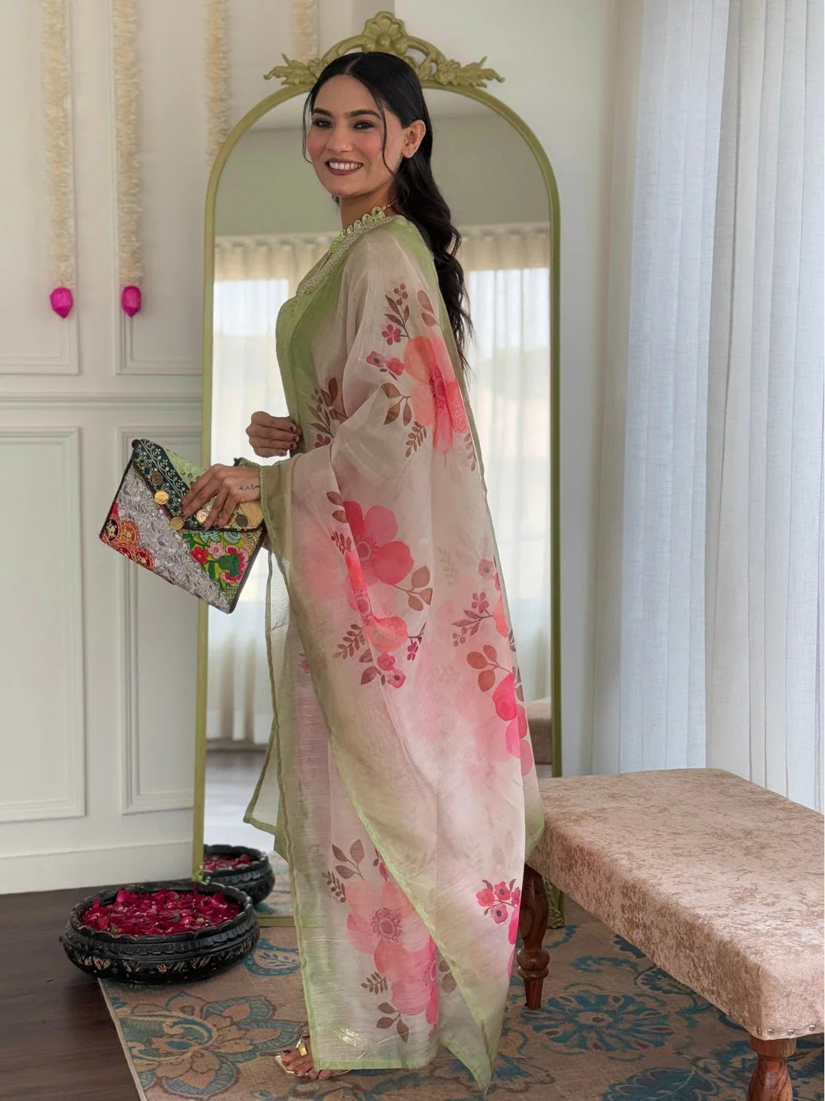 Tarani pista rayon kurti side pose with floral printed dupatta