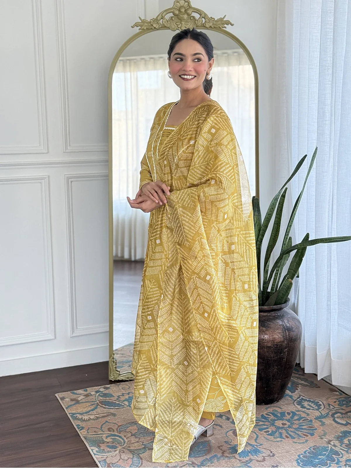 Tarani rayon yellow dress front pose showing full kurti pant and dupatta styling