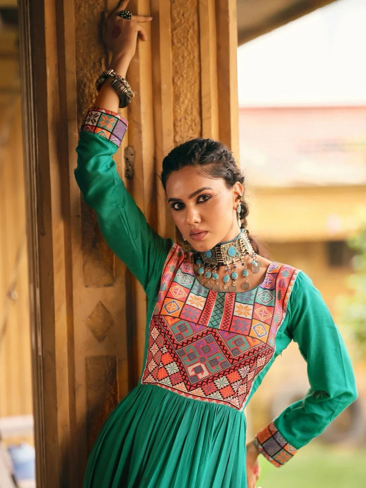 Tarani rayon green gown upper body close-up with colorful Gamthi neck design