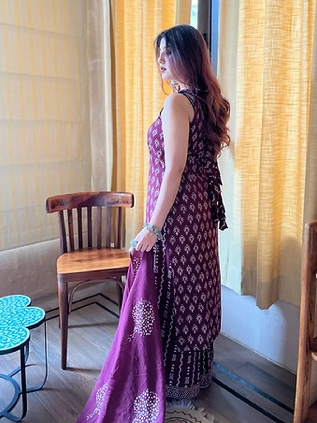 Tarani rayon slub side profile of maroon dress showing shoulder tie-back and graceful dupatta drape