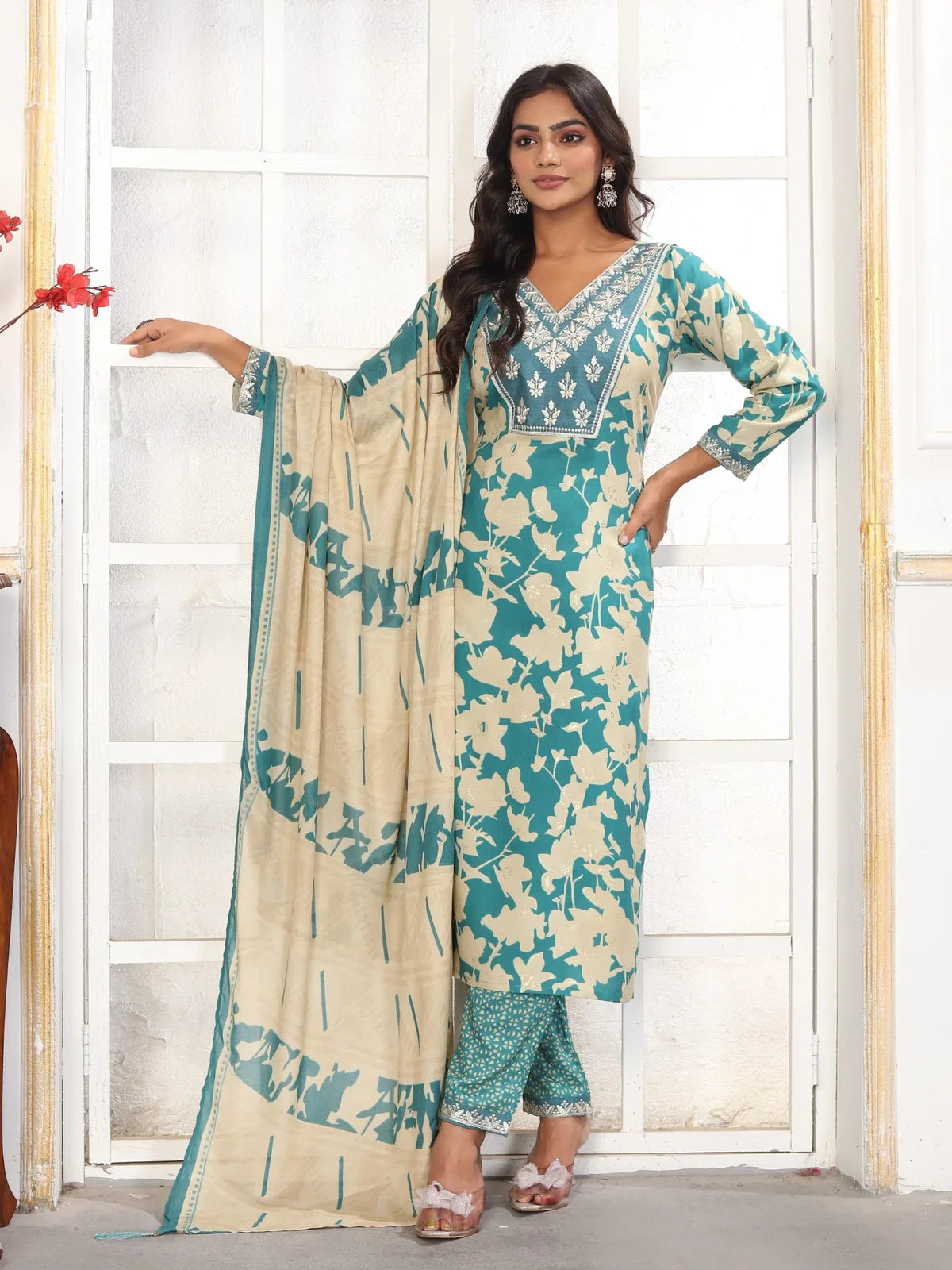 Tarani front view of rayon dress with model holding dupatta elegantly