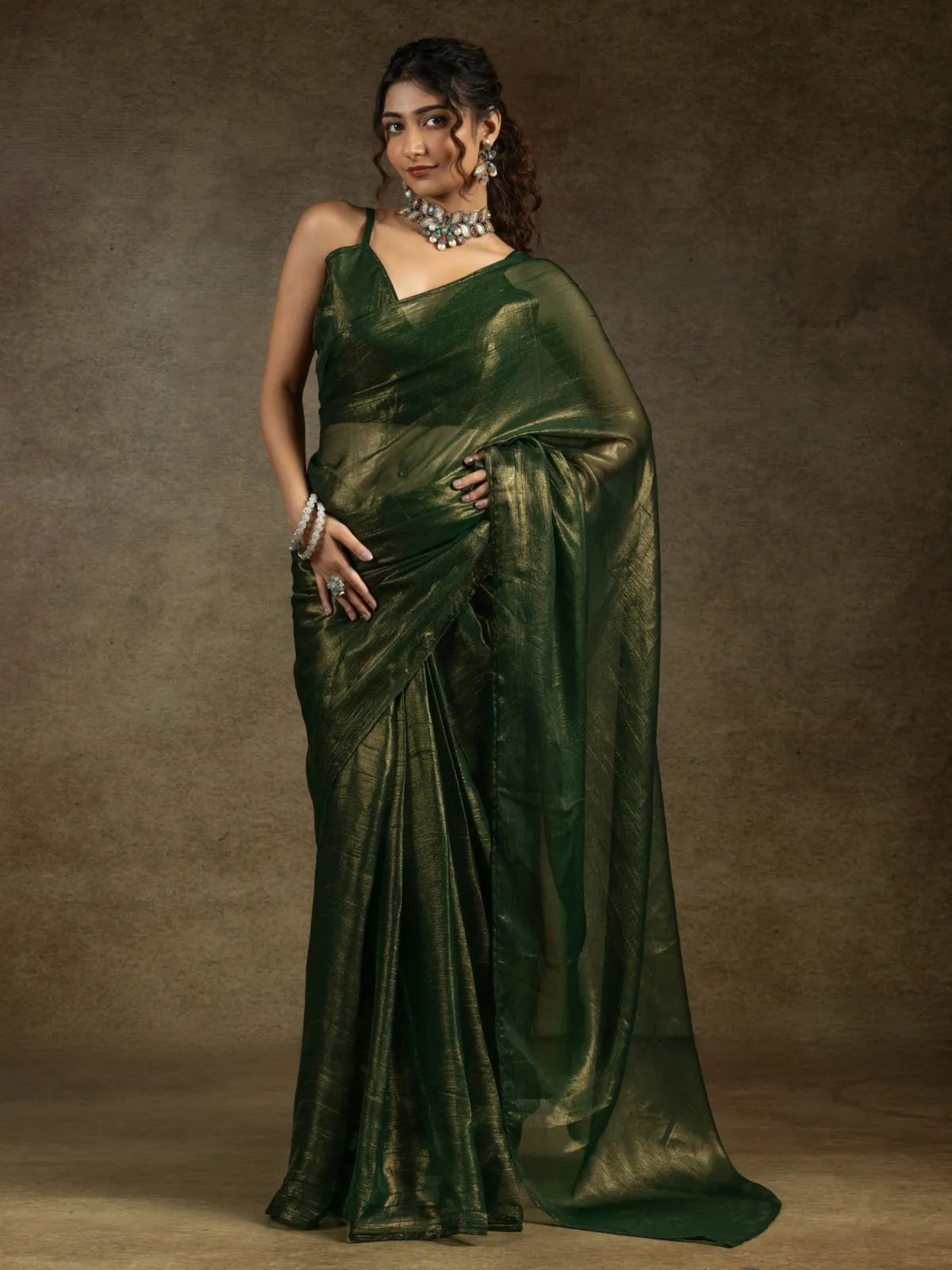 Tarani green satin chiffon party wear saree with shimmer finish and elegant full view