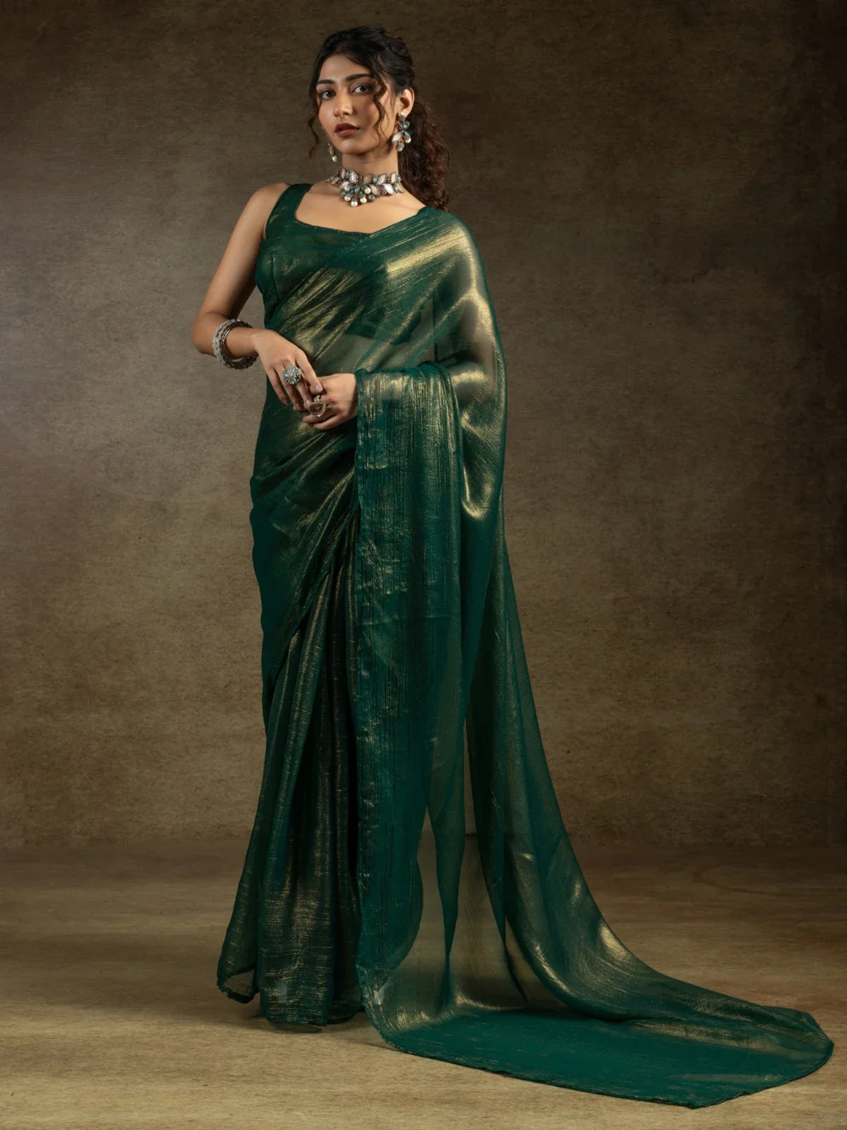 Tarani green satin chiffon saree with golden glow in full-view for festive occasions