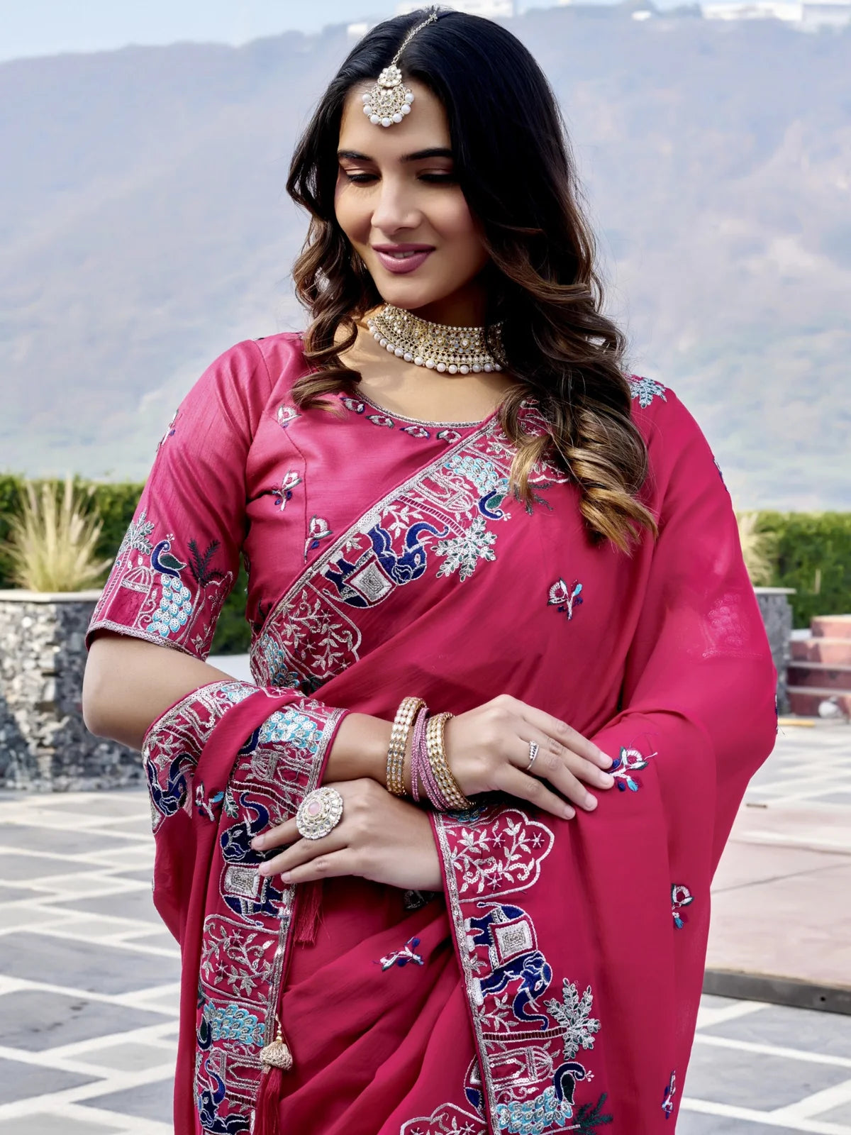 Tarani pure satin chiffon magenta saree with embroidered border upper body portrait view