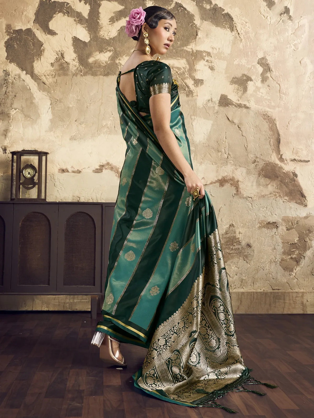 Tarani green satin saree back view with woven pallu