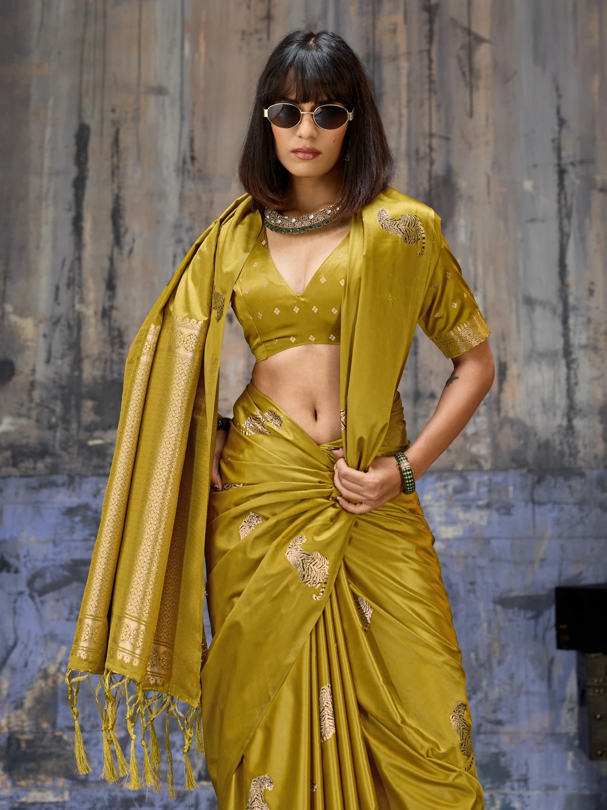 Tarani designer satin saree closeup view with woven blouse and handloom pattern