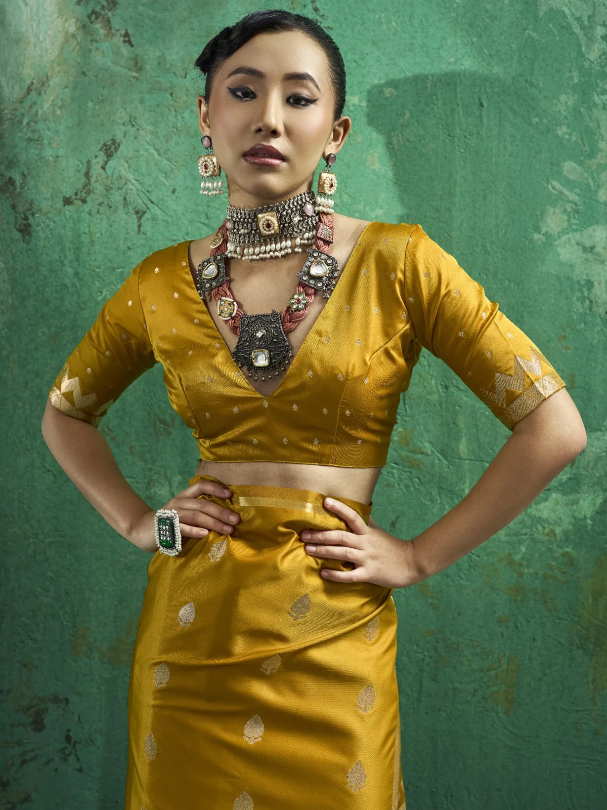 Tarani Leena mustard pure satin saree upper body view with designer blouse and woven detailing