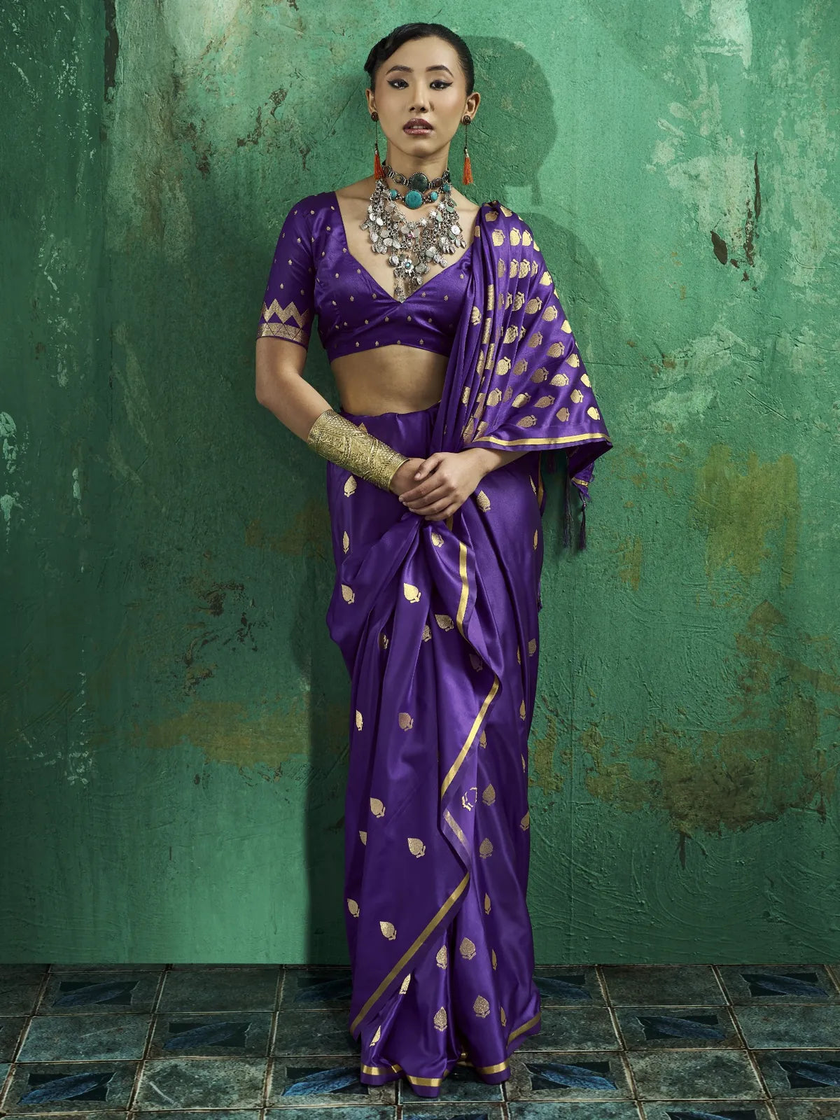 Tarani Eshanya front view pure satin purple saree with elegant zari weaving