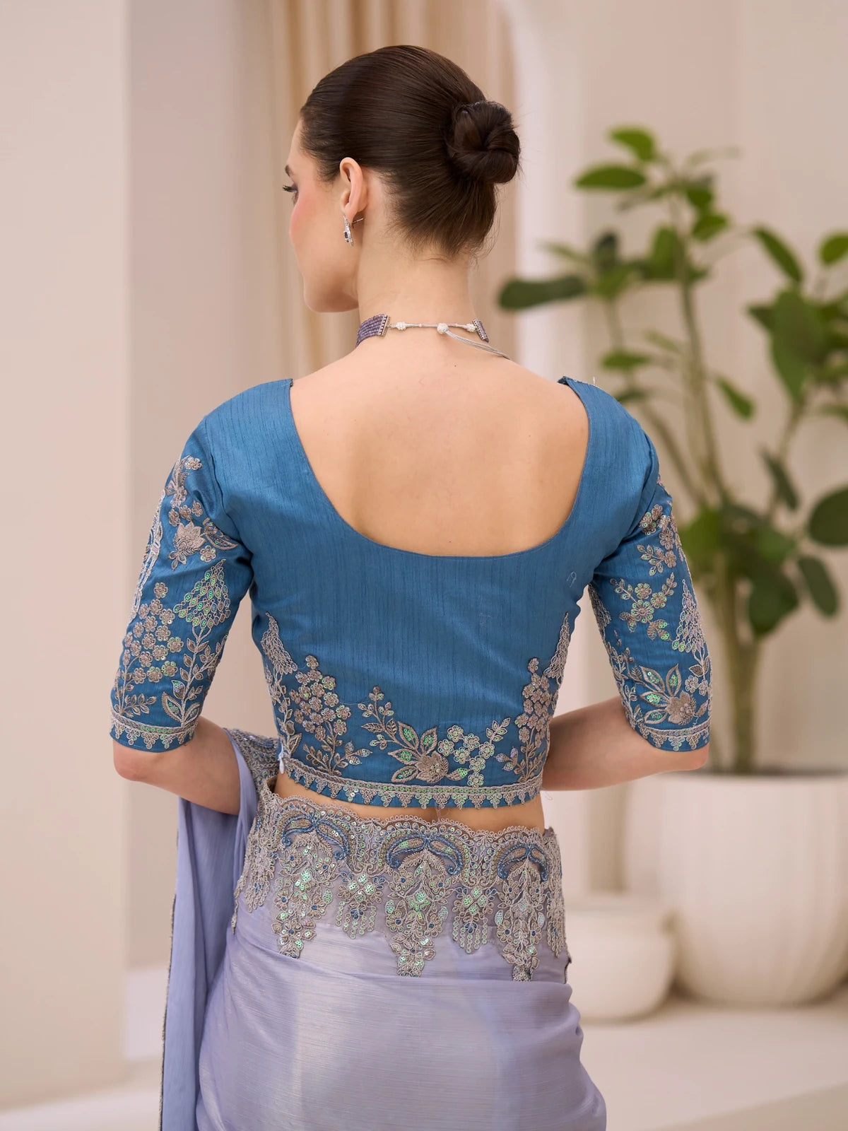 Tarani Unnati silver shimmer satin saree back view showcasing embroidered blouse design