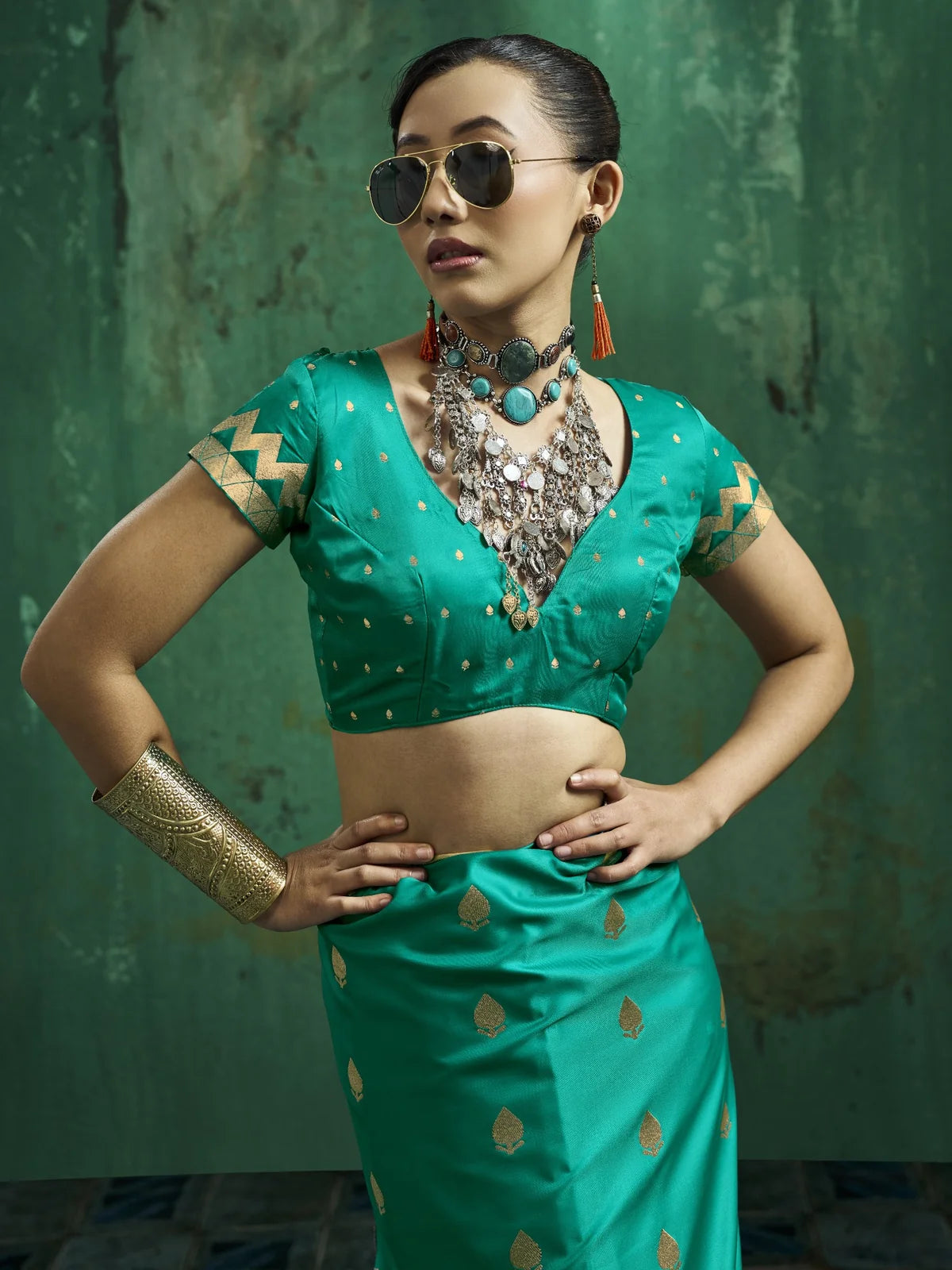Tarani teal green Pure Satin Handloom Weaving saree upper body view featuring blouse and woven detailing
