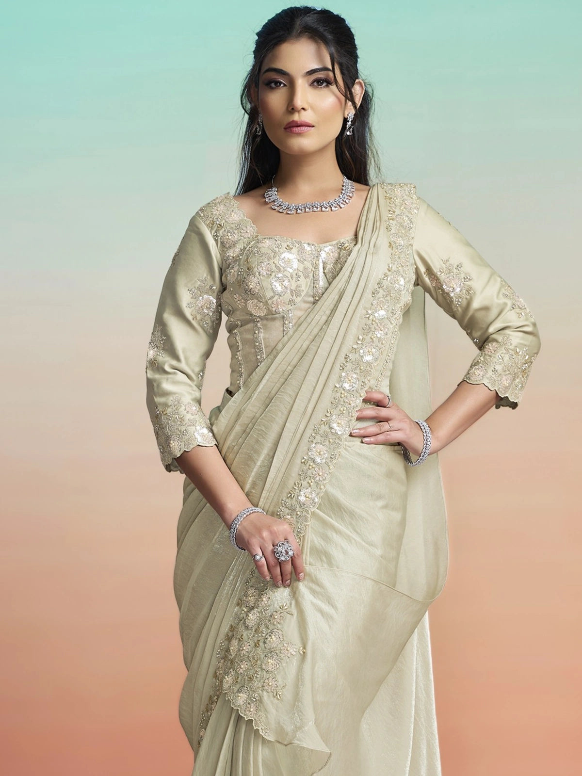 Tarani Harini beige satin silk ready to wear saree front view with embroidered border and belt