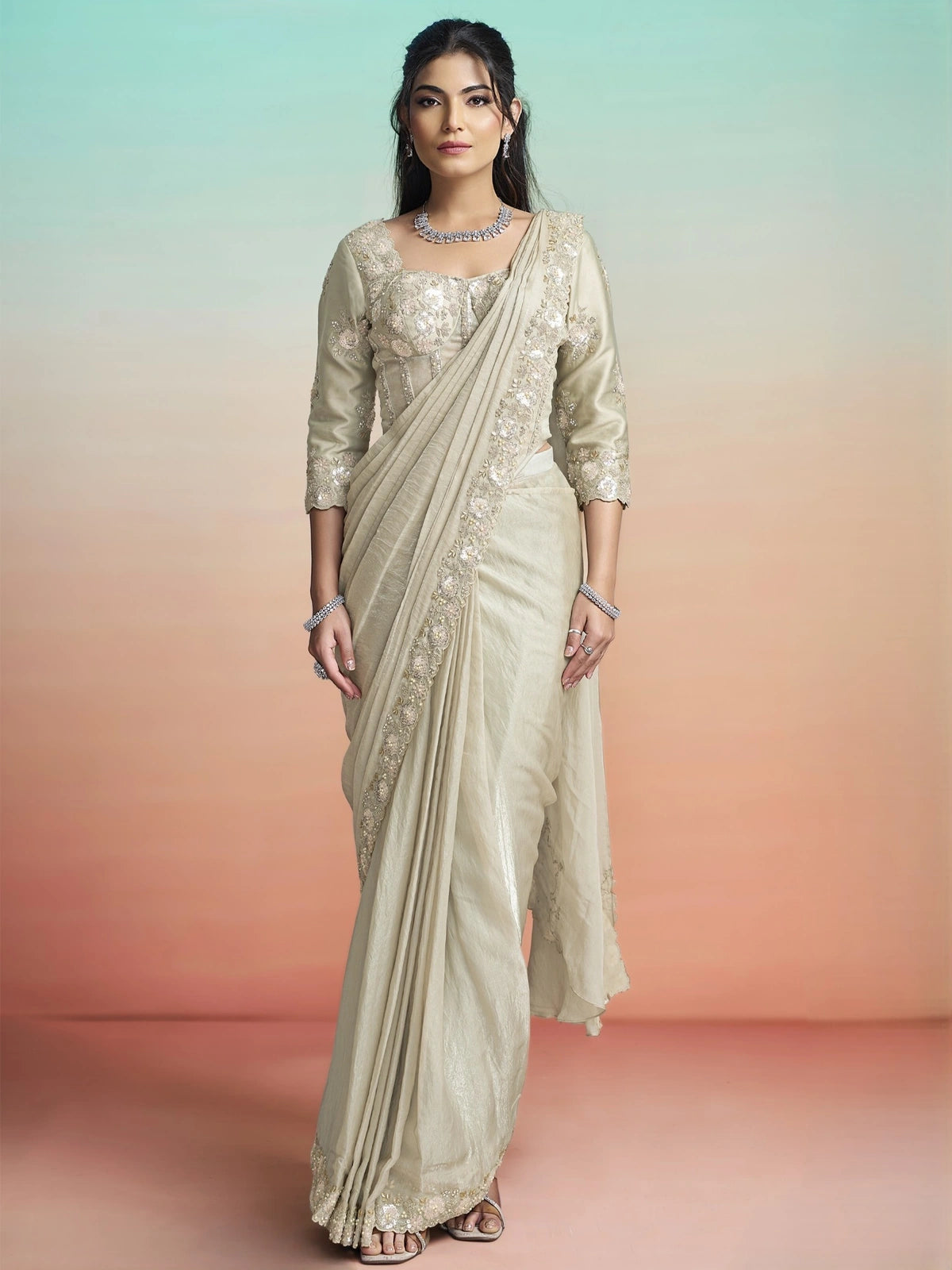 Tarani Harini beige satin silk ready to wear saree full view with corset blouse and pearl work