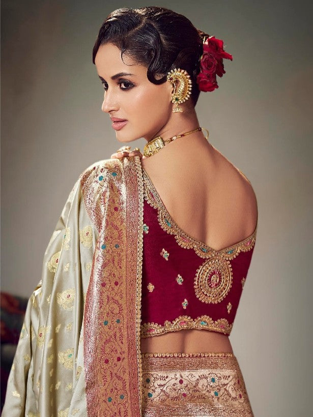Tarani satin silk golden saree back view showing detailed embroidery blouse design