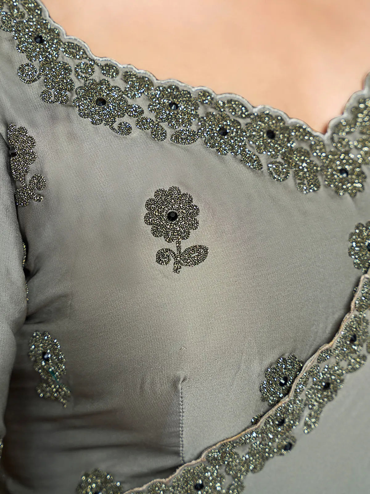 Tarani grey satin silk saree closeup embroidery with black stones and floral blouse design
