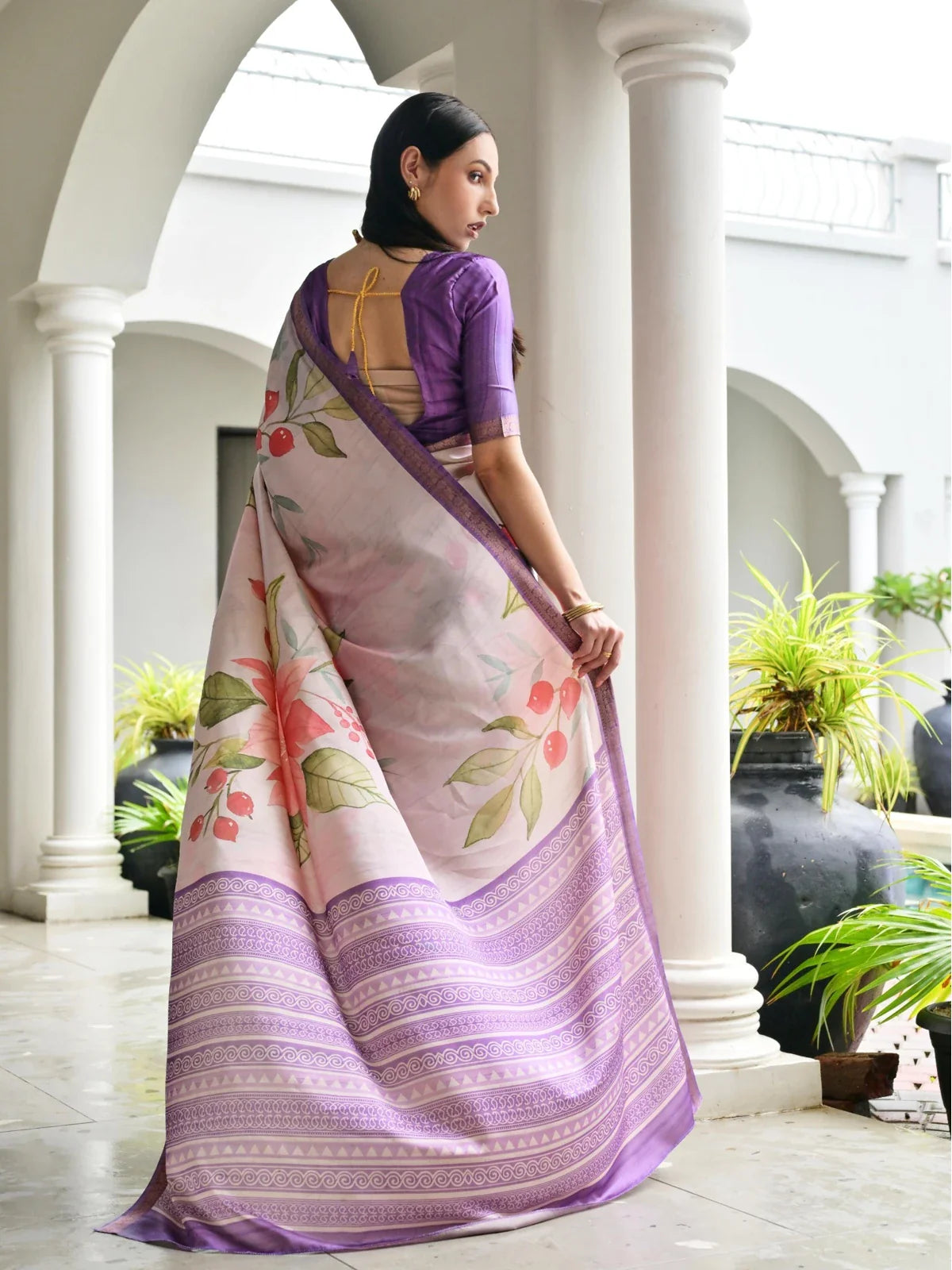 Back view of Tarani soft satin printed saree with purple blouse