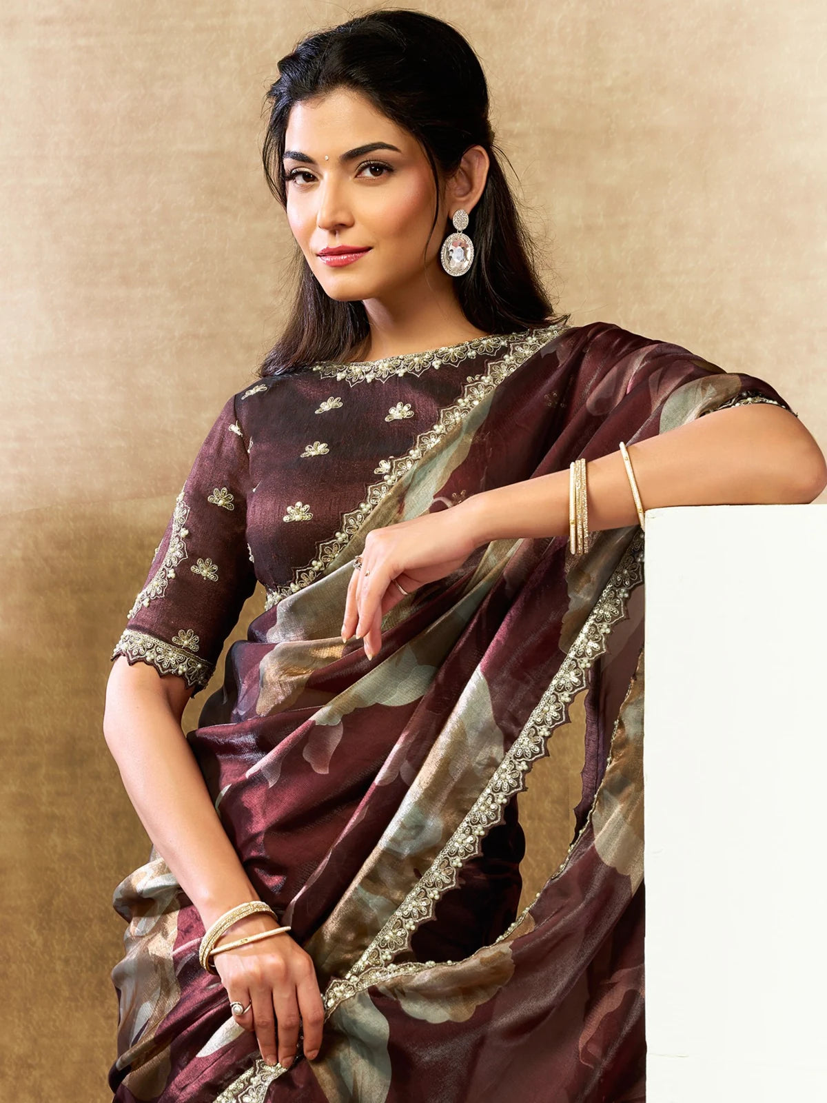 Tarani maroon satin silk saree upper body view with floral print and embellished border