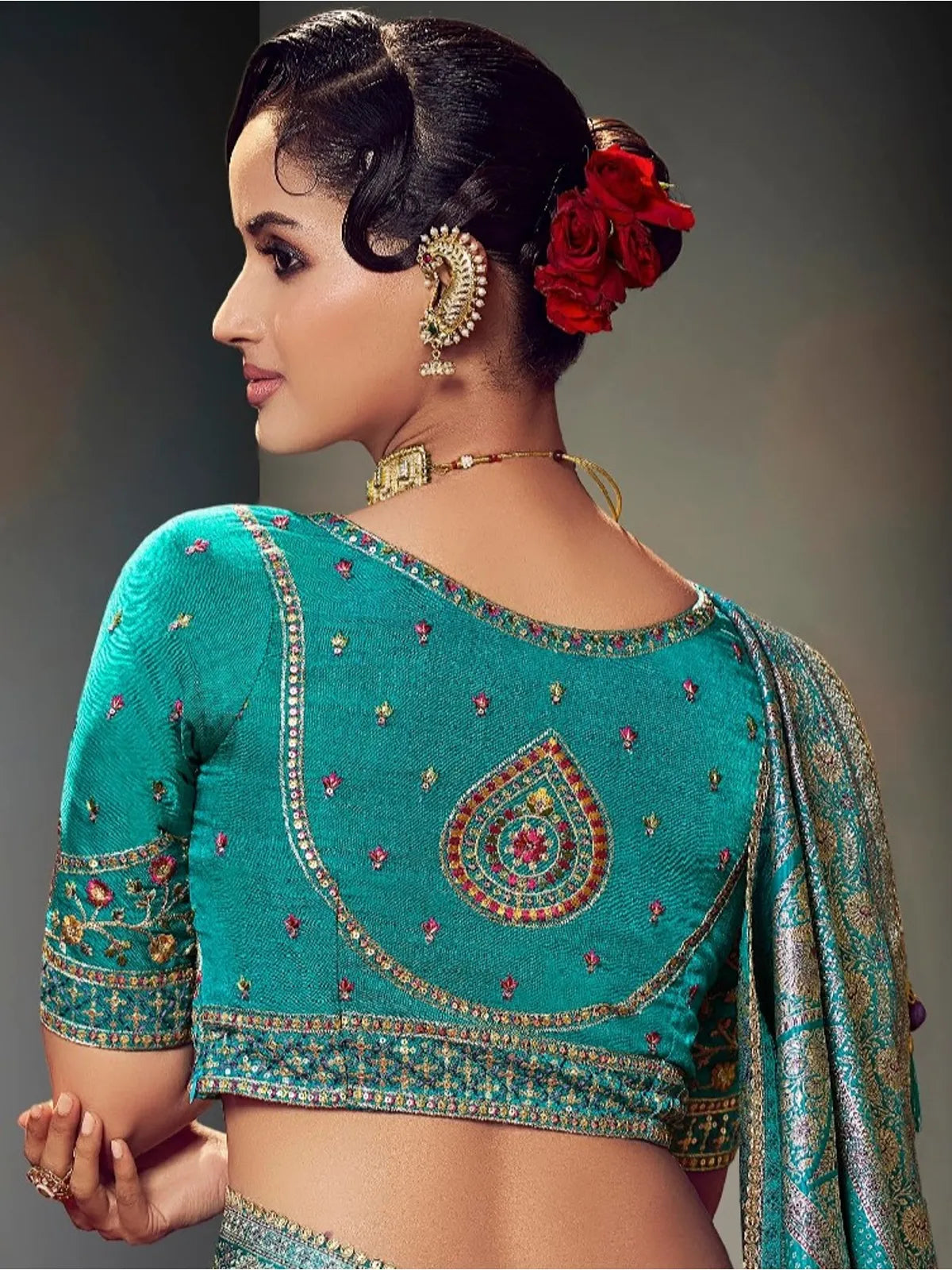 Tarani purple satin silk saree back view highlighting blouse embroidery and border