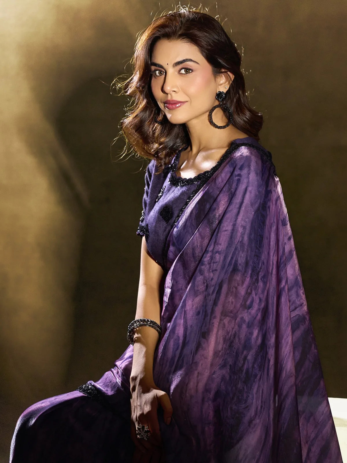 Tarani Ulka purple satin silk saree side view with elegant drape and abstract print