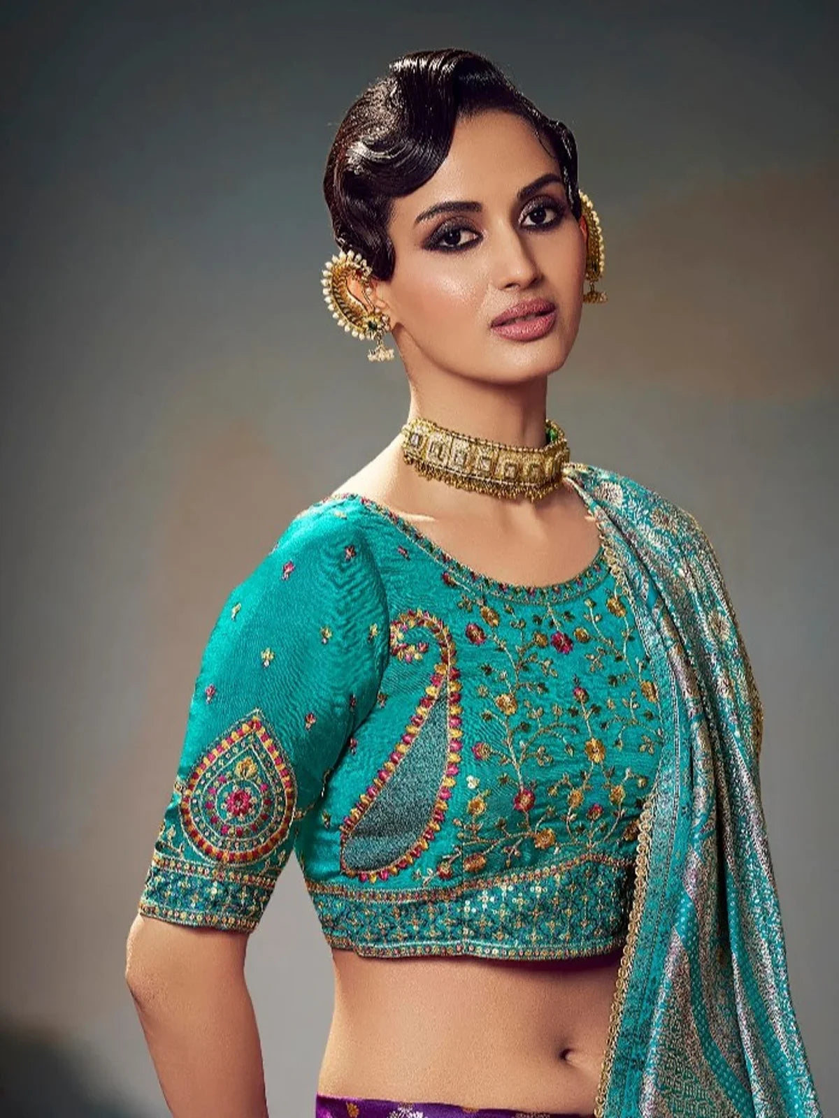 Tarani purple satin silk saree upper body view showing turquoise embroidered blouse