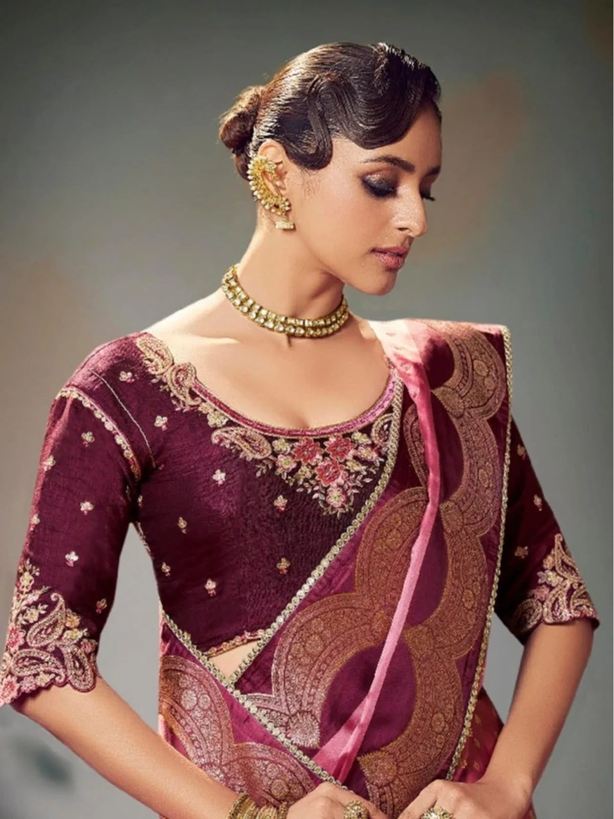 Tarani rose pink satin silk saree upper body close-up showing blouse embroidery and rich border design