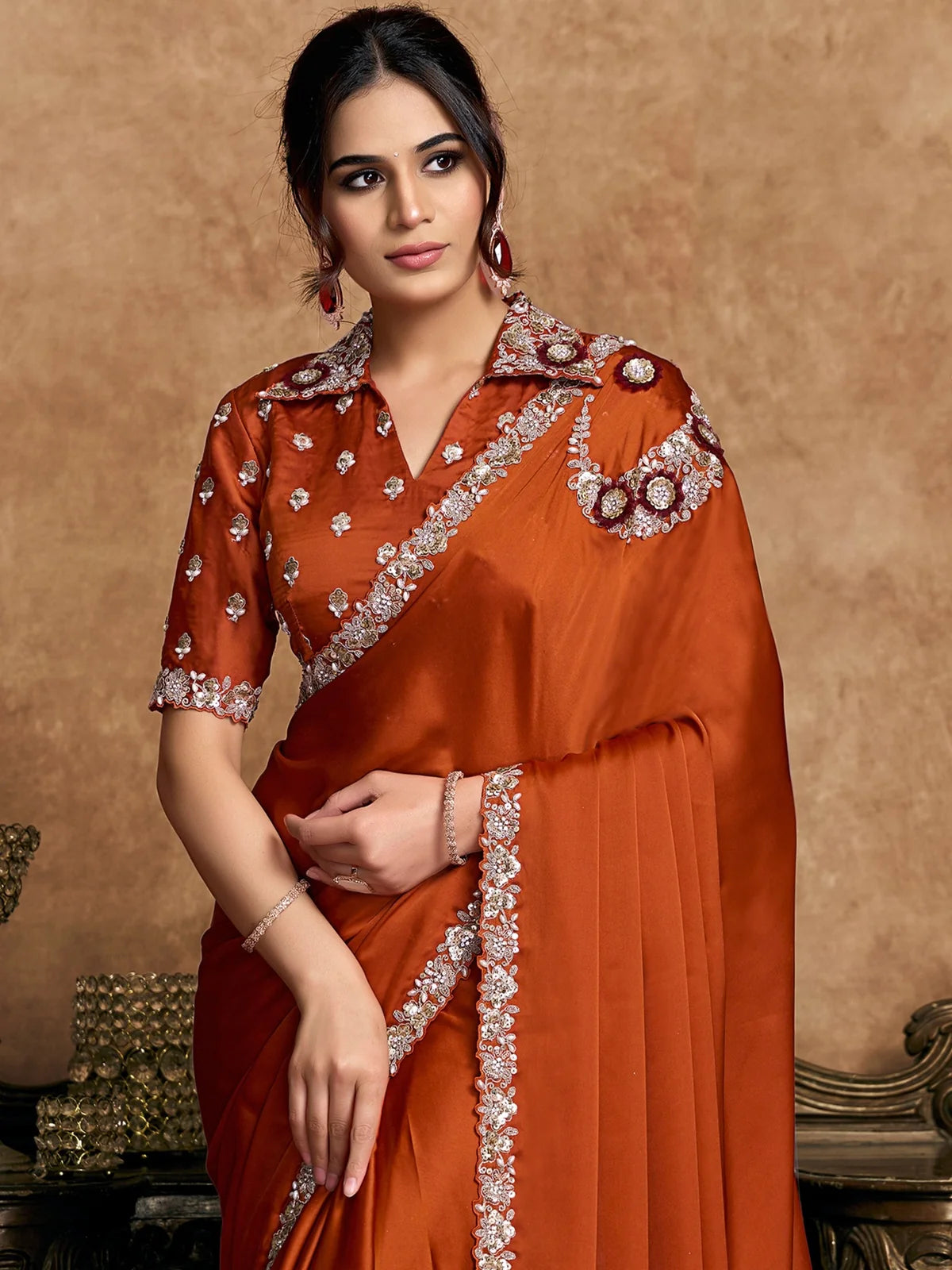 Tarani Ravina front view rust orange satin silk saree with elegant drape for wedding and festive wear