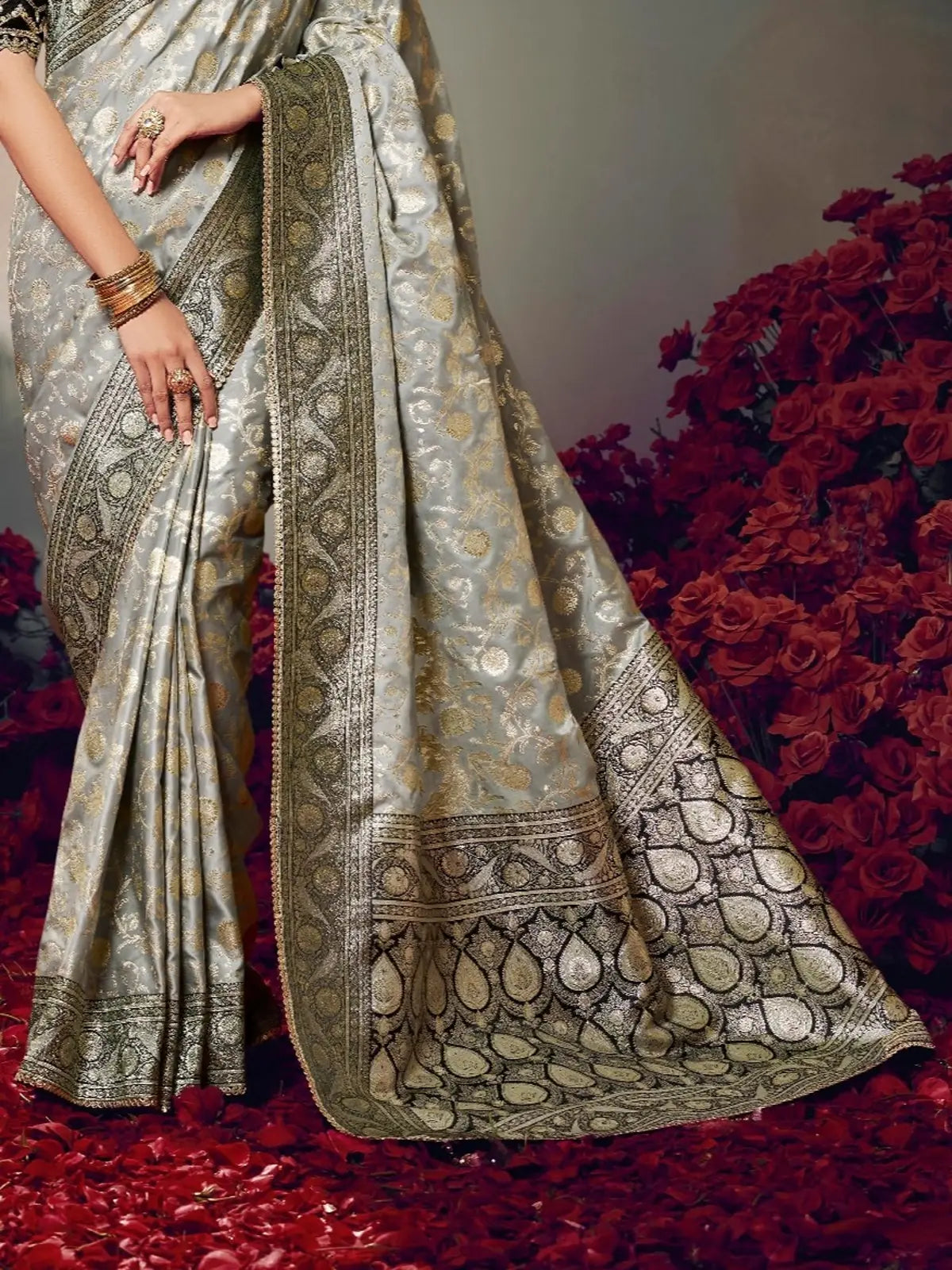 Tarani silver satin silk saree pallu view showcasing zari border and woven detailing