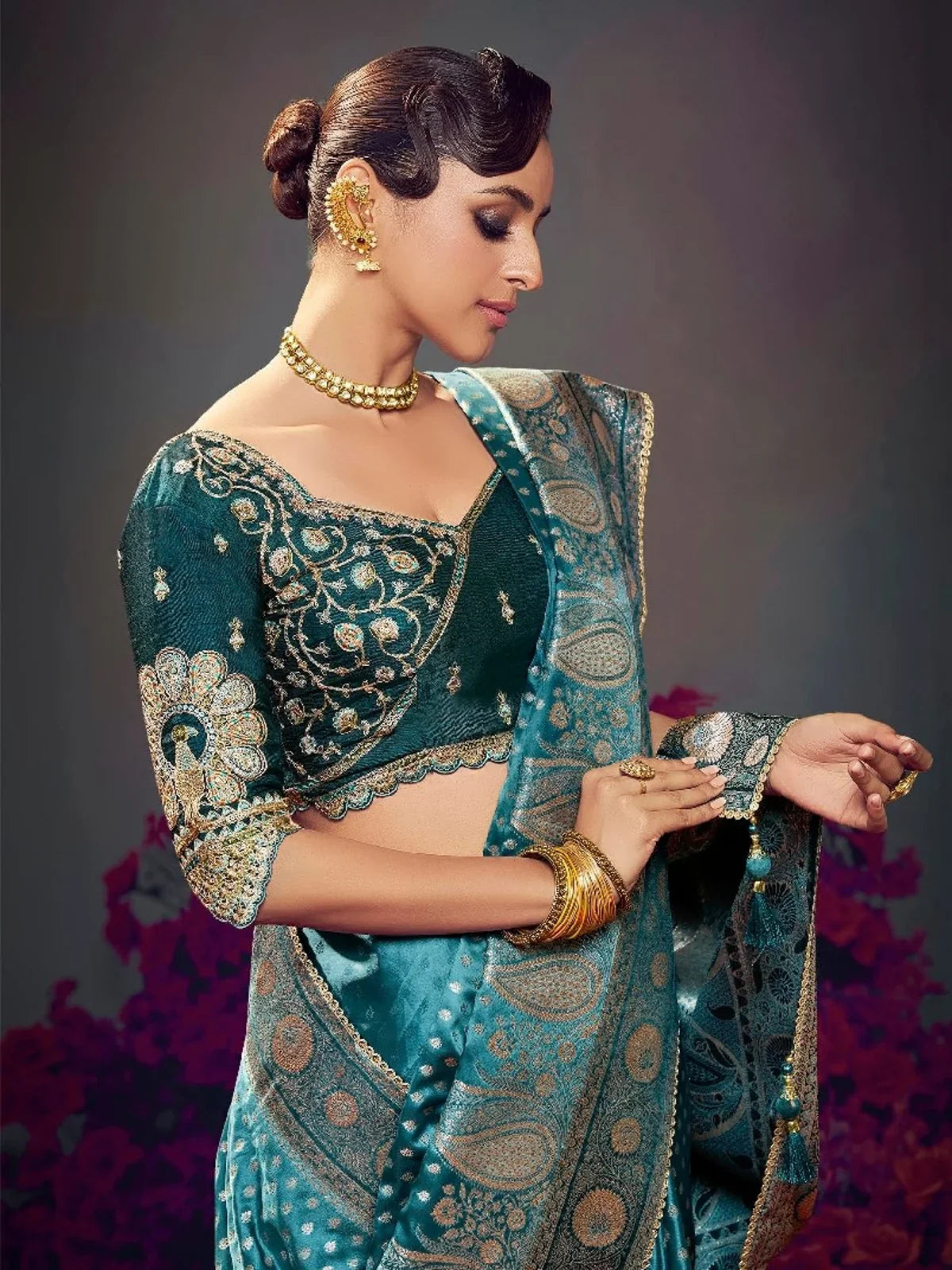 Tarani teal satin silk saree close upper body view with elegant embroidered blouse