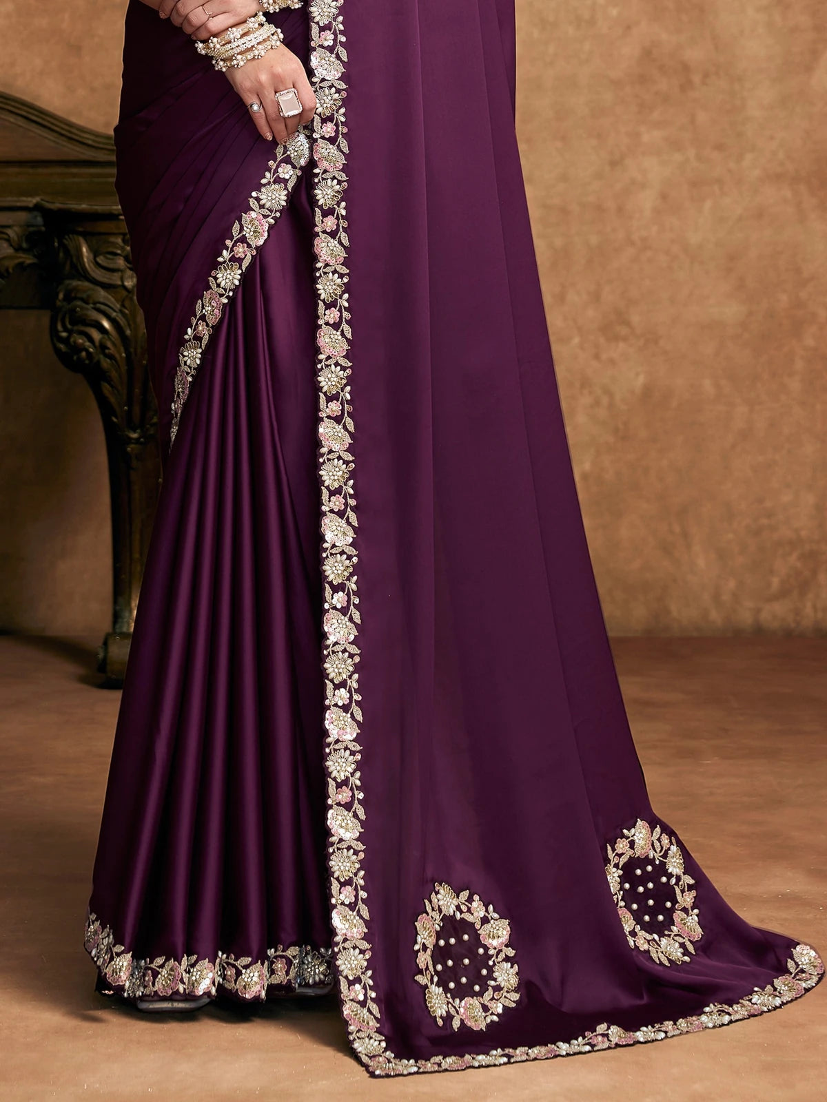 Tarani wine satin silk saree pallu view with embroidered border and sequin detailing