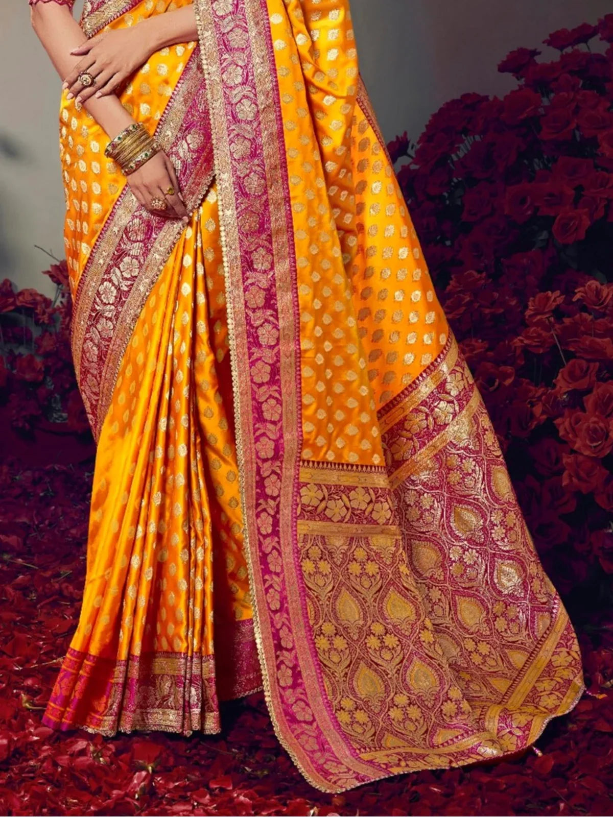 Tarani yellow satin silk saree detailed pallu and border close view