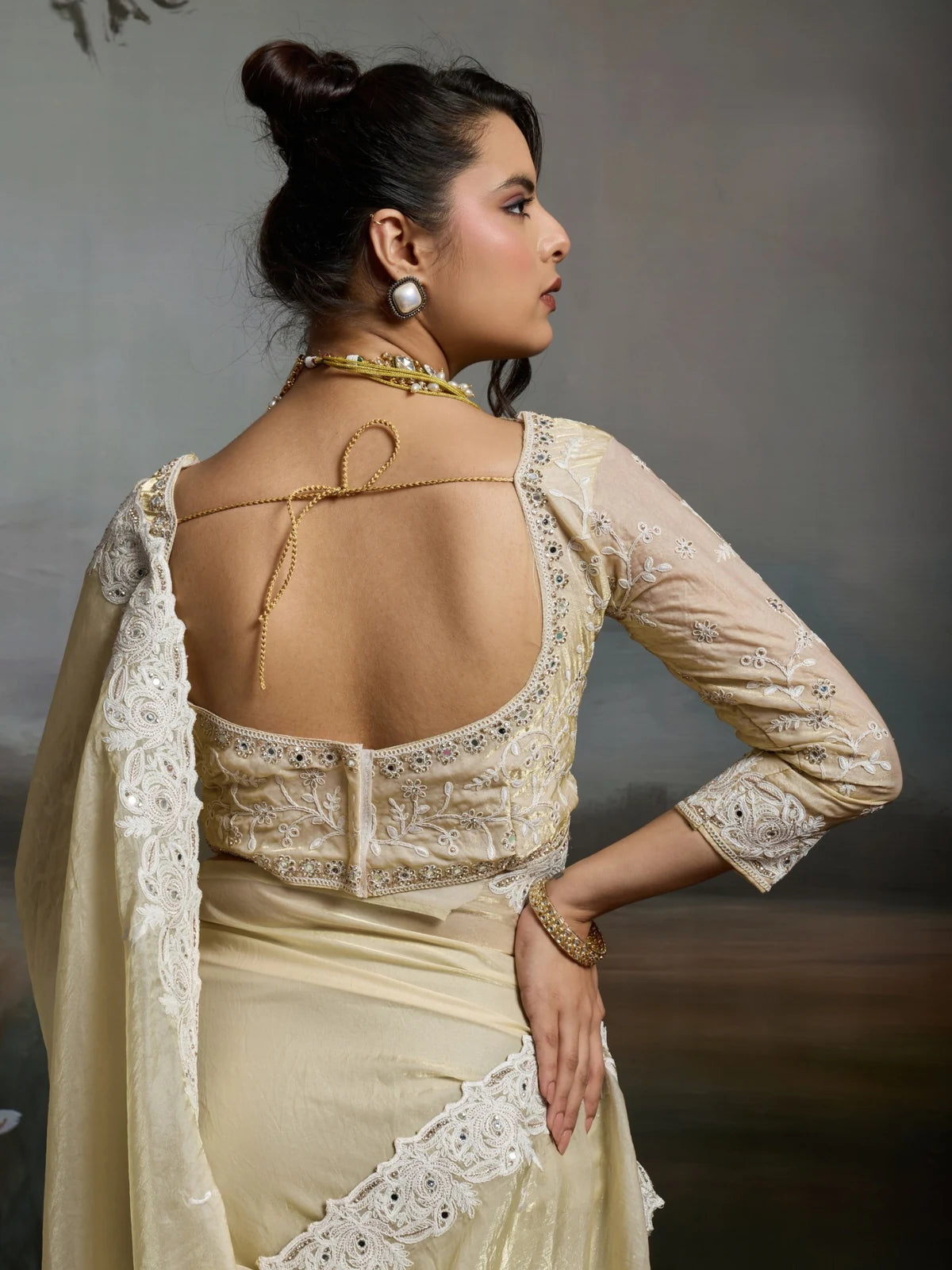 Tarani off white satin velvet saree back blouse view with embroidered full sleeve handwork design