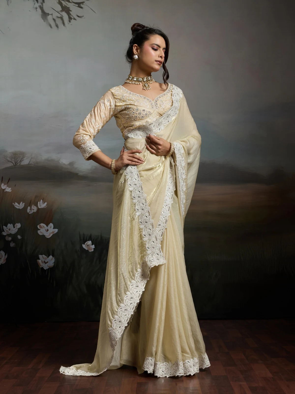 Tarani elegant off white satin velvet saree front view with detailed ivory embroidered border
