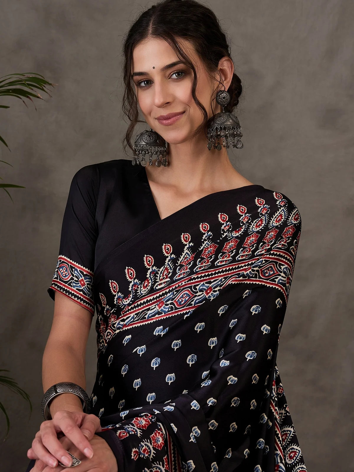 Tarani black Semi Modal Satin saree front view with printed border Chetali