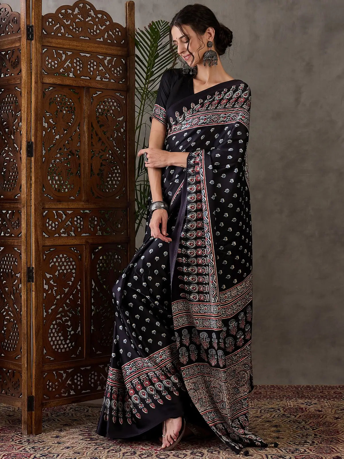 Tarani black festive saree full drape view with detailed pallu Chetali