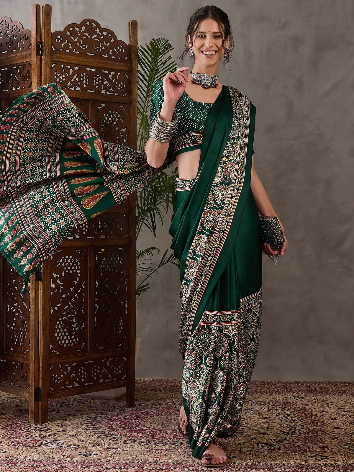 Tarani green printed semi modal satin saree front view with elegant festive styling
