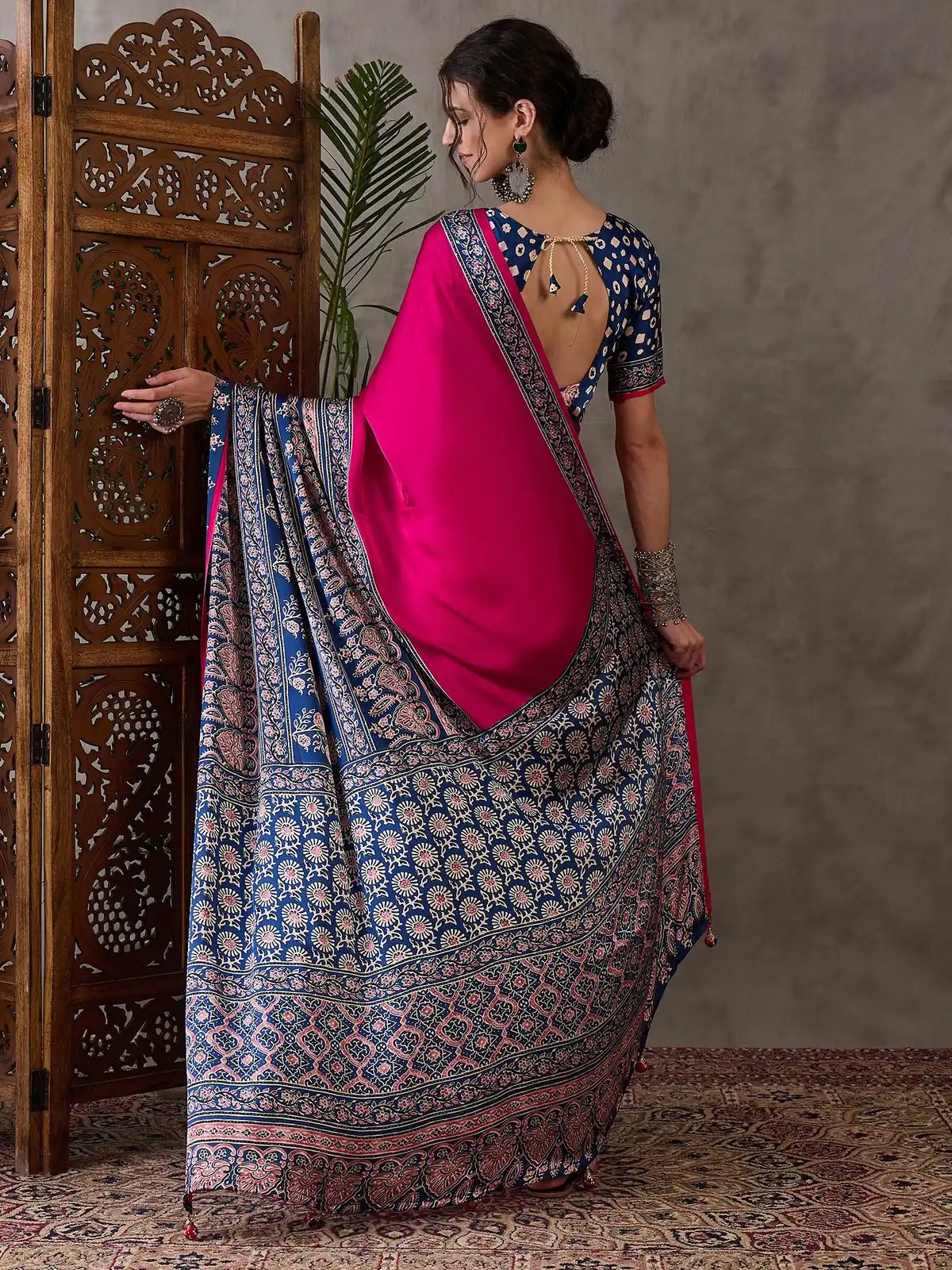 Tarani magenta saree back view showing blouse and pallu design
