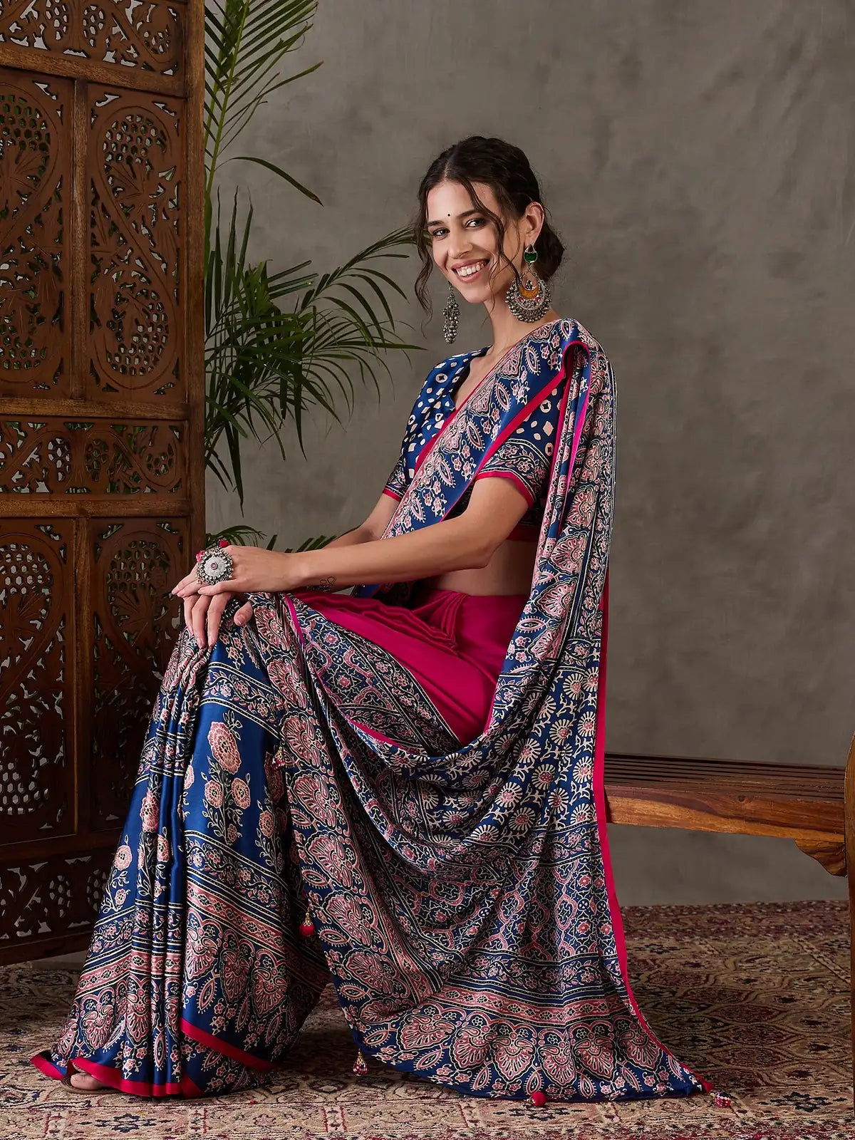 Tarani printed pallu view of semi modal satin magenta saree