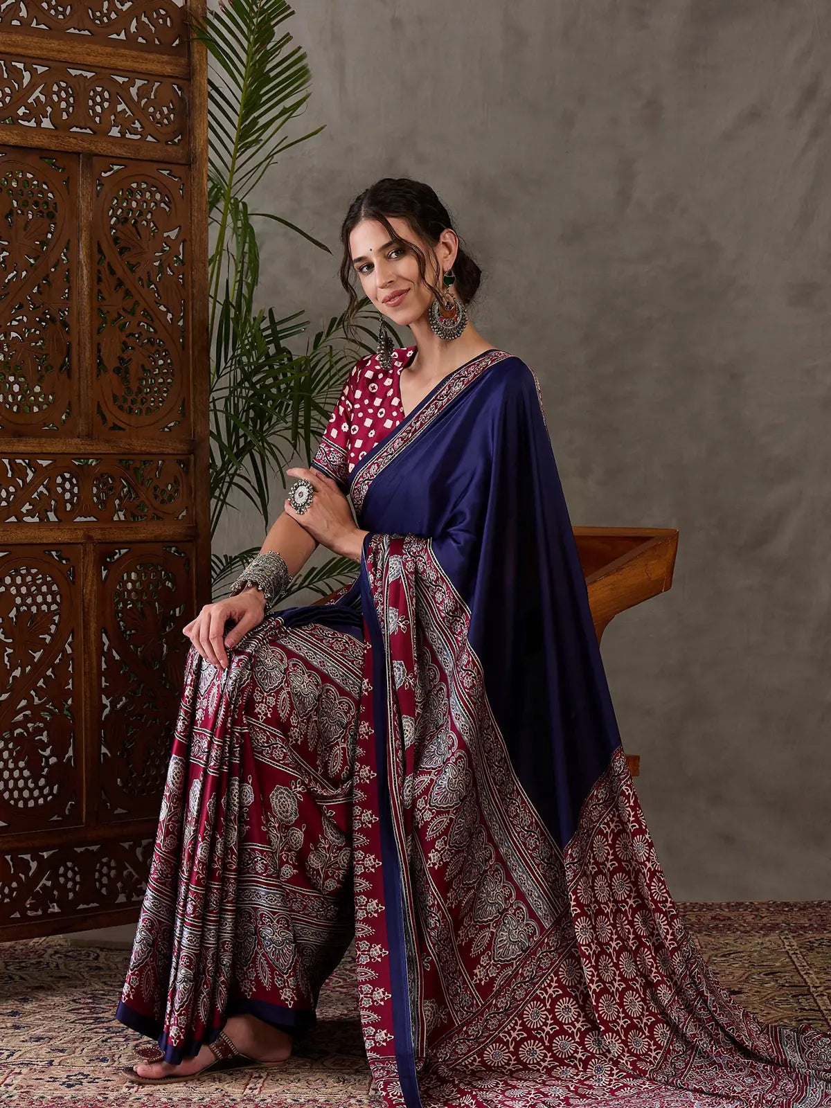 Tarani Ishaniya navy blue semi modal satin printed saree front angle with rich border work