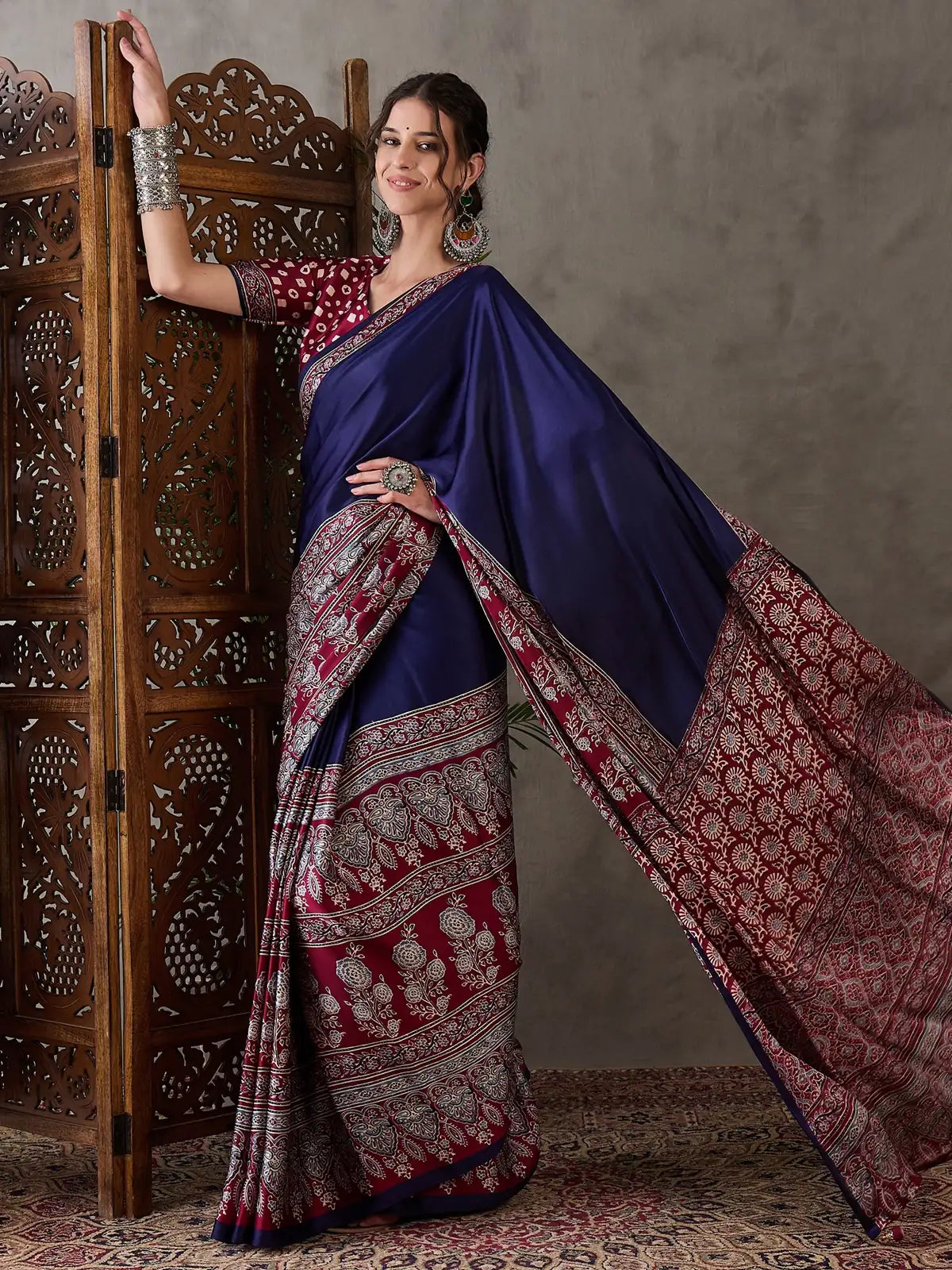 Tarani Ishaniya navy blue semi modal satin saree pallu view with detailed traditional print border