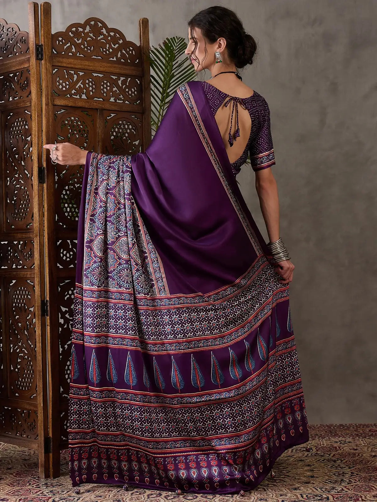 Tarani Jigyasa purple semi modal satin saree back view displaying pallu and blouse back design