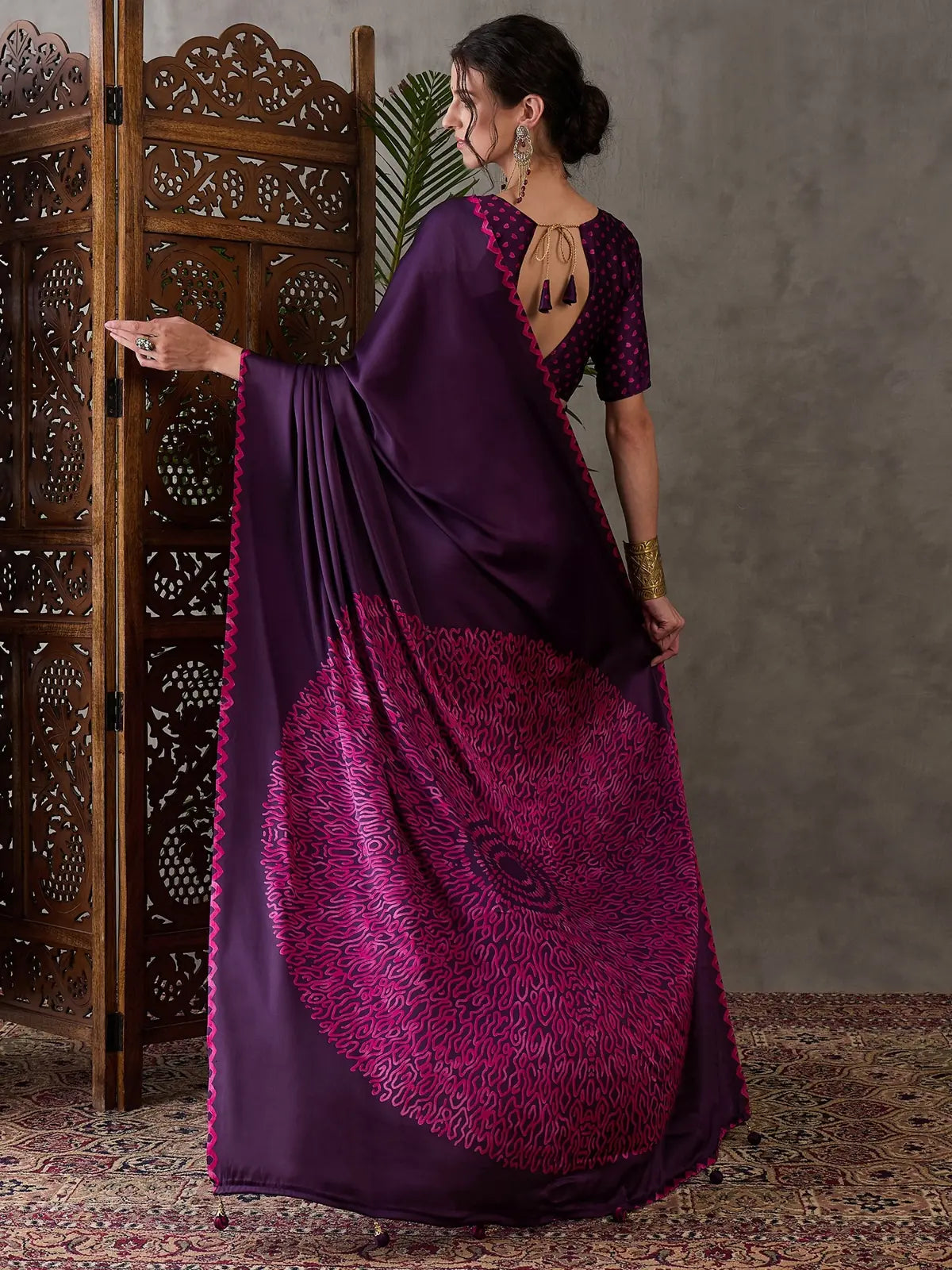 Tarani purple saree back view showing blouse design and pallu