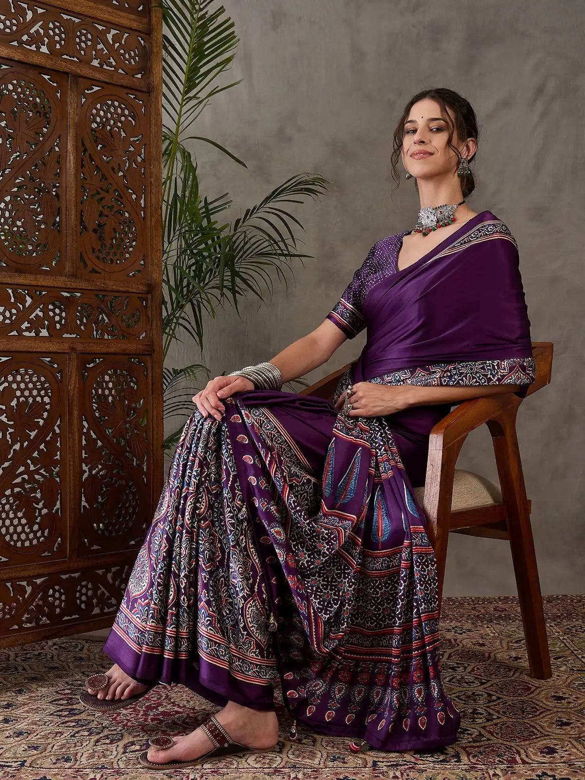 Tarani Jigyasa purple semi modal satin saree front seated view with printed pallu