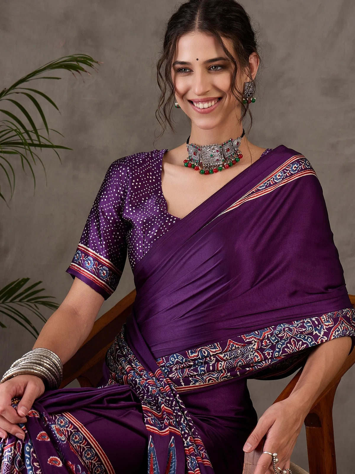 Tarani Jigyasa purple semi modal satin saree close upper body portrait showcasing blouse pattern