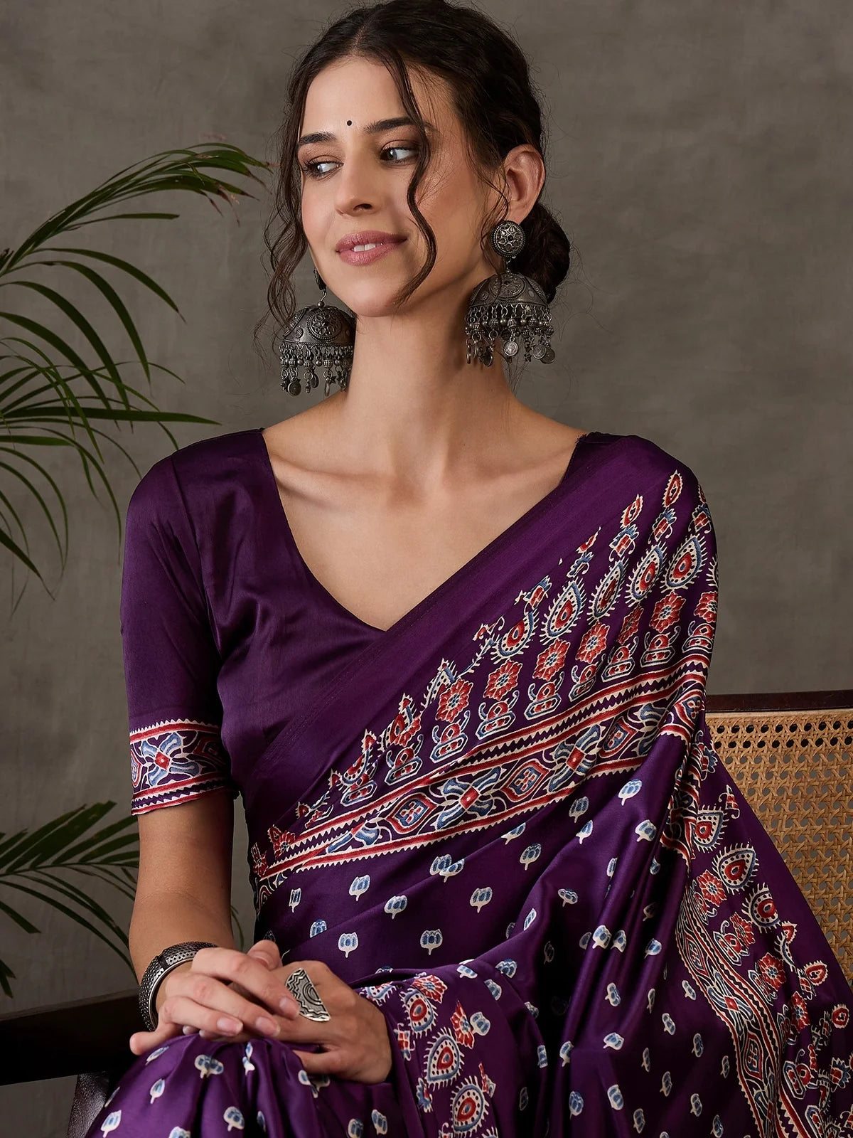 Tarani Pravika semi modal satin saree upper body view with printed motifs