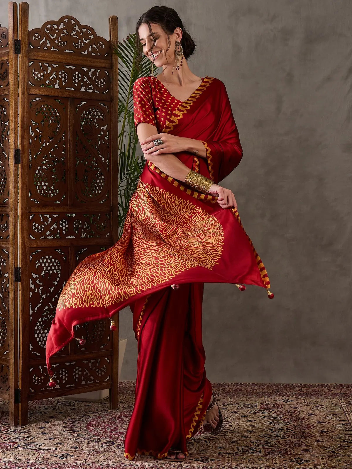 Tarani red semi modal satin party wear saree front pose with elegant drape