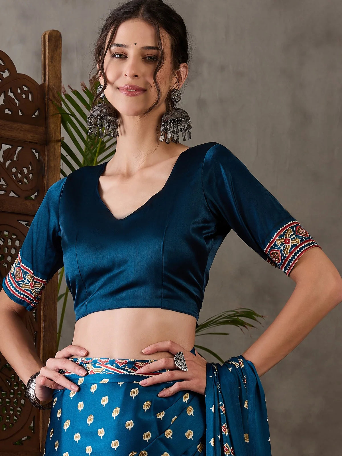 Tarani Namrata teal semi modal satin saree upper body view showing blouse design