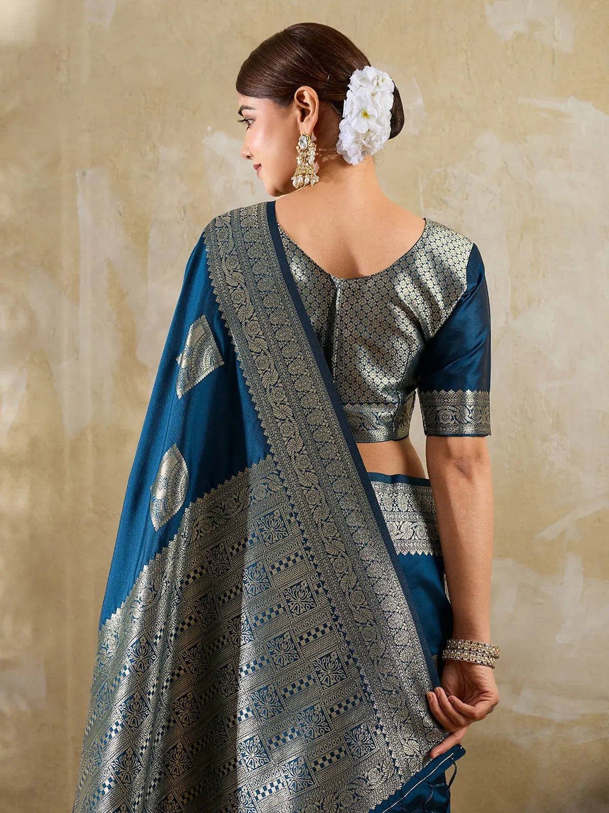 Tarani blue blouse view saree with intricate zari woven detailing